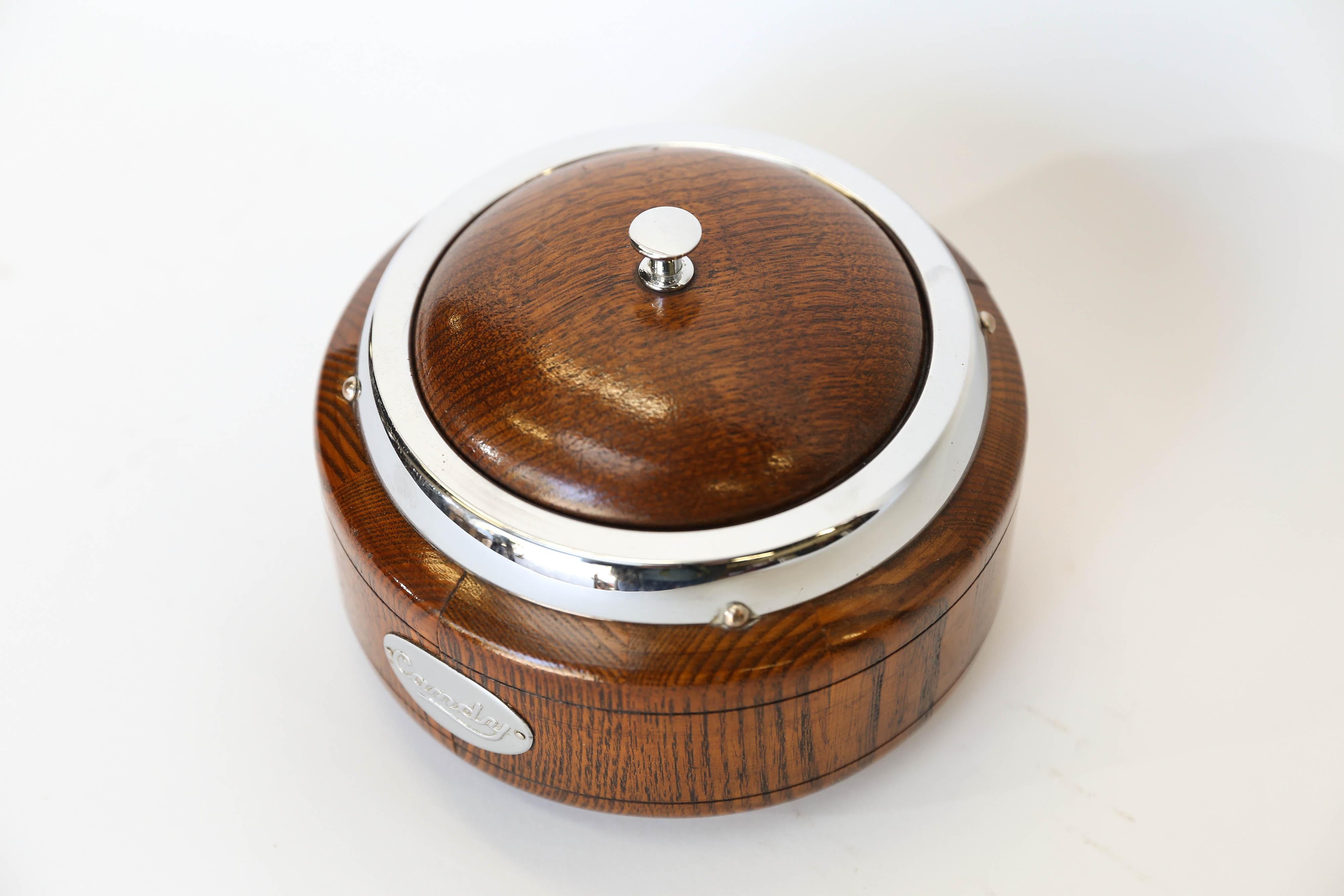 Lovely English oak candy dish with lid and a plastic liner. A perfect way to store and serve candy with English charm.