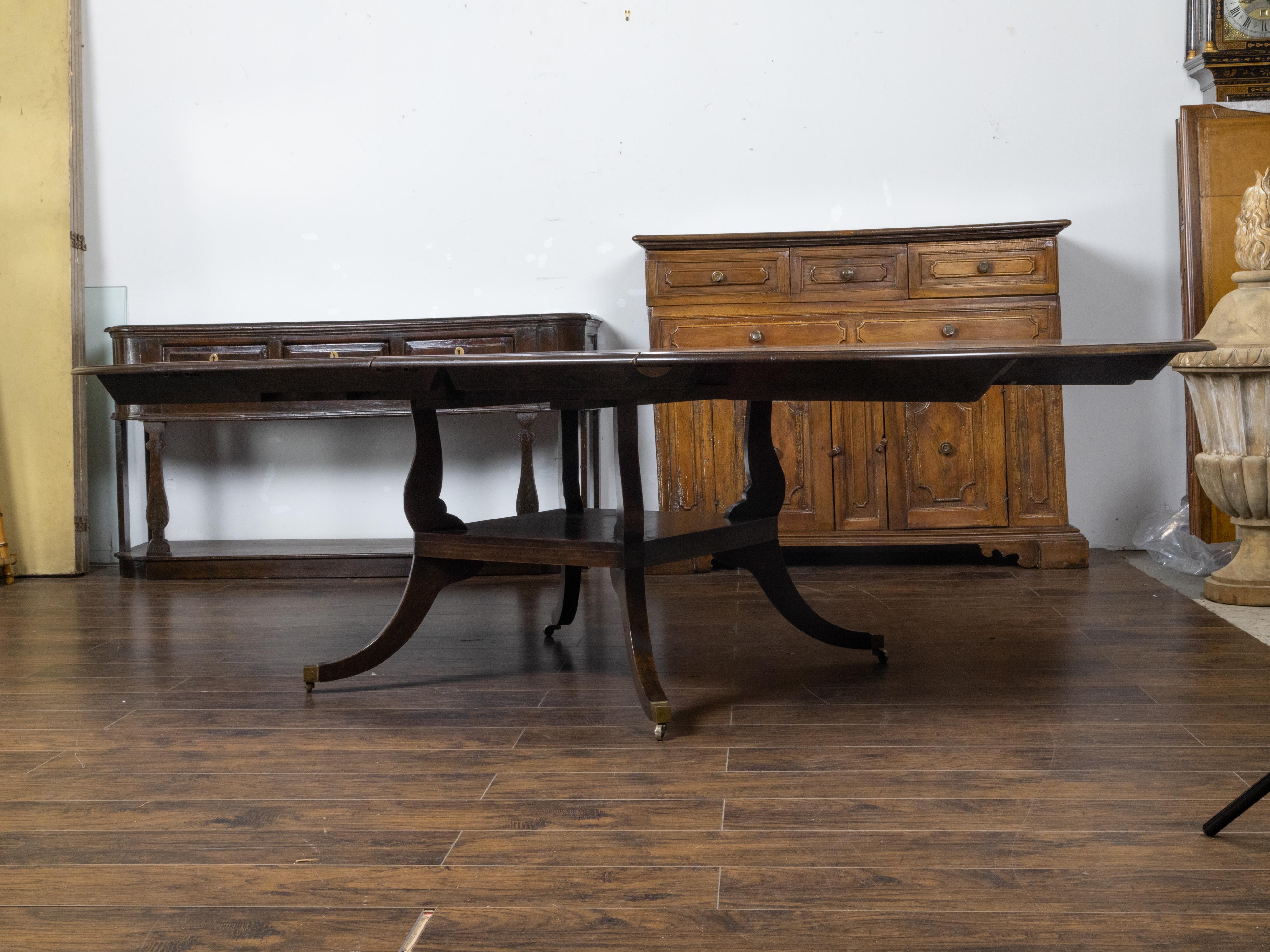 Vintage English Oak Extension Table with Two Leaves and Four Legs on Casters For Sale 7