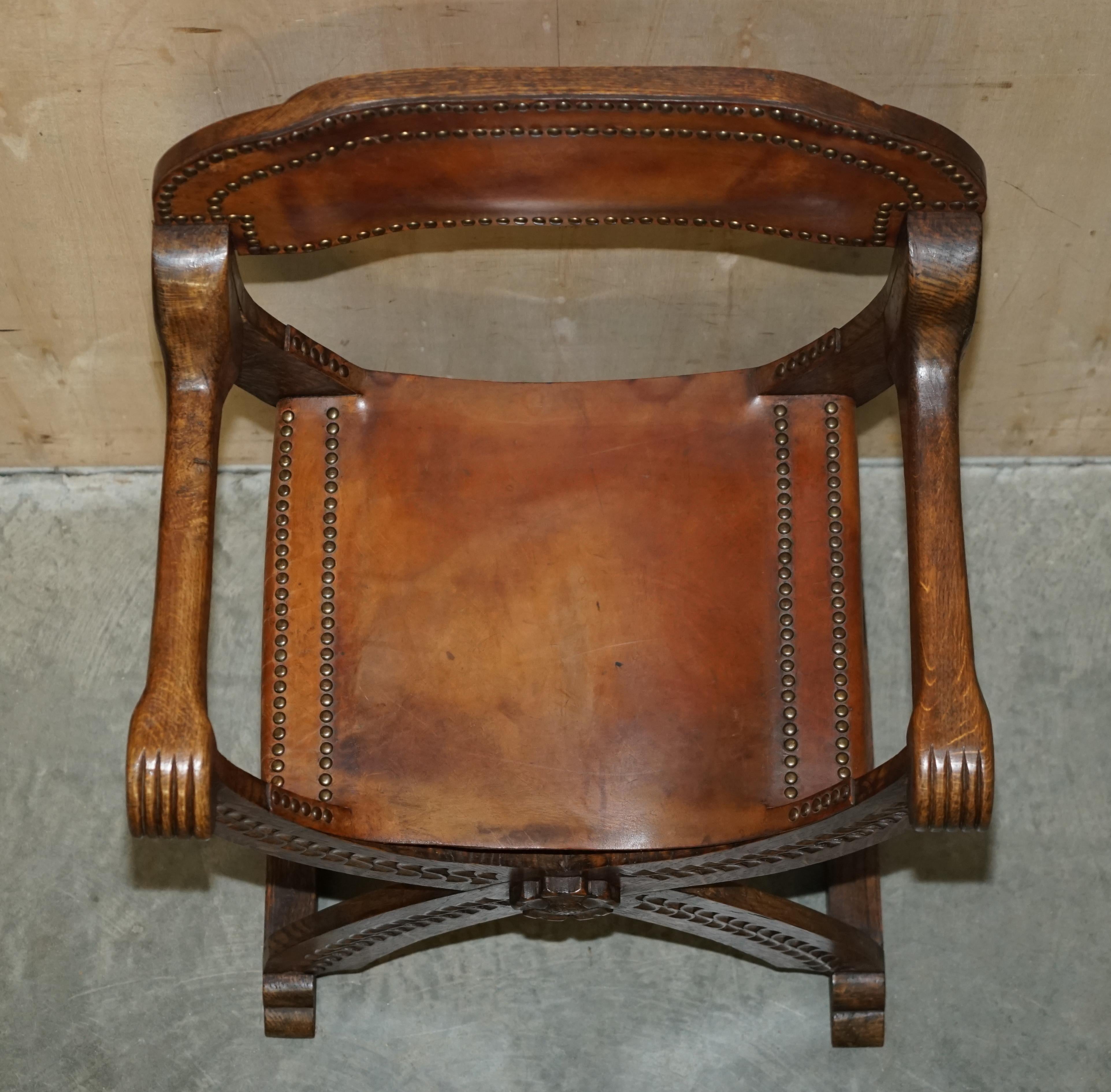 Vintage English Oak Jacobean Style Hand Carved Brown Leather x Framed Armchair For Sale 8