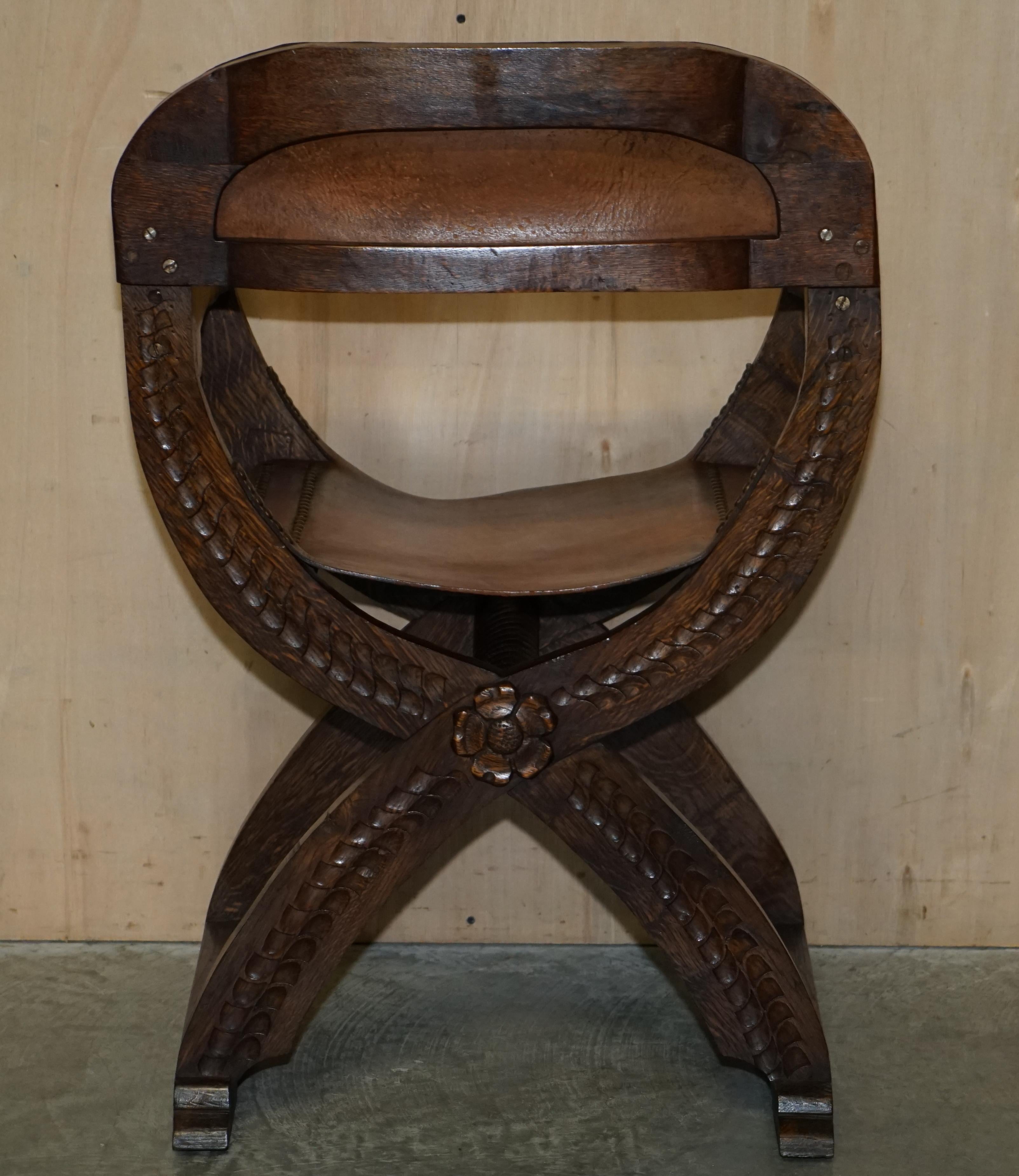 Vintage English Oak Jacobean Style Hand Carved Brown Leather x Framed Armchair For Sale 11