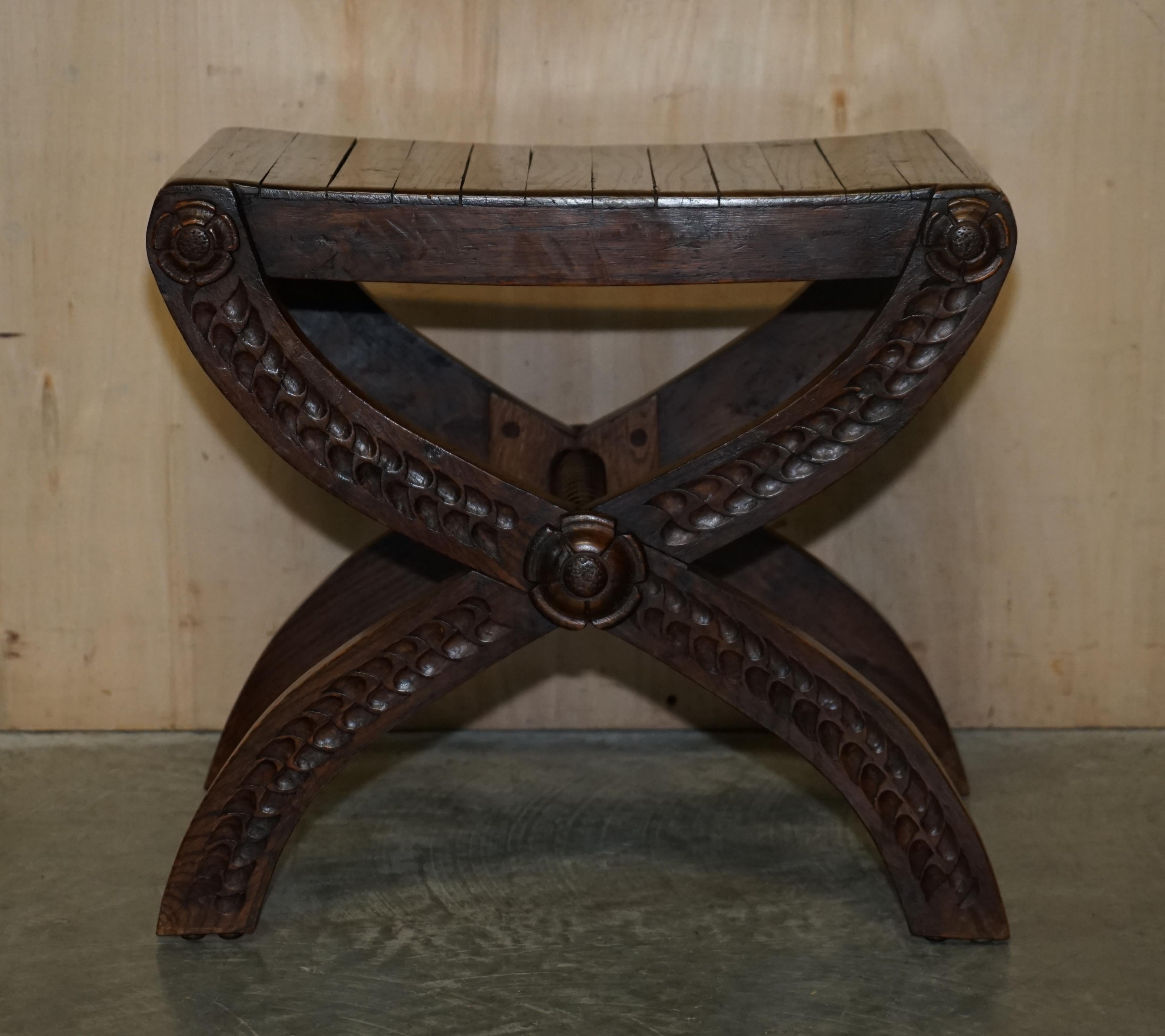 We are delighted to offer for sale this stunning hand carved vintage Jacobean style X framed stool with ornate detailing all over which is part of suite

This piece is part of a set, I have one single stool, a suite of four stools, a matching