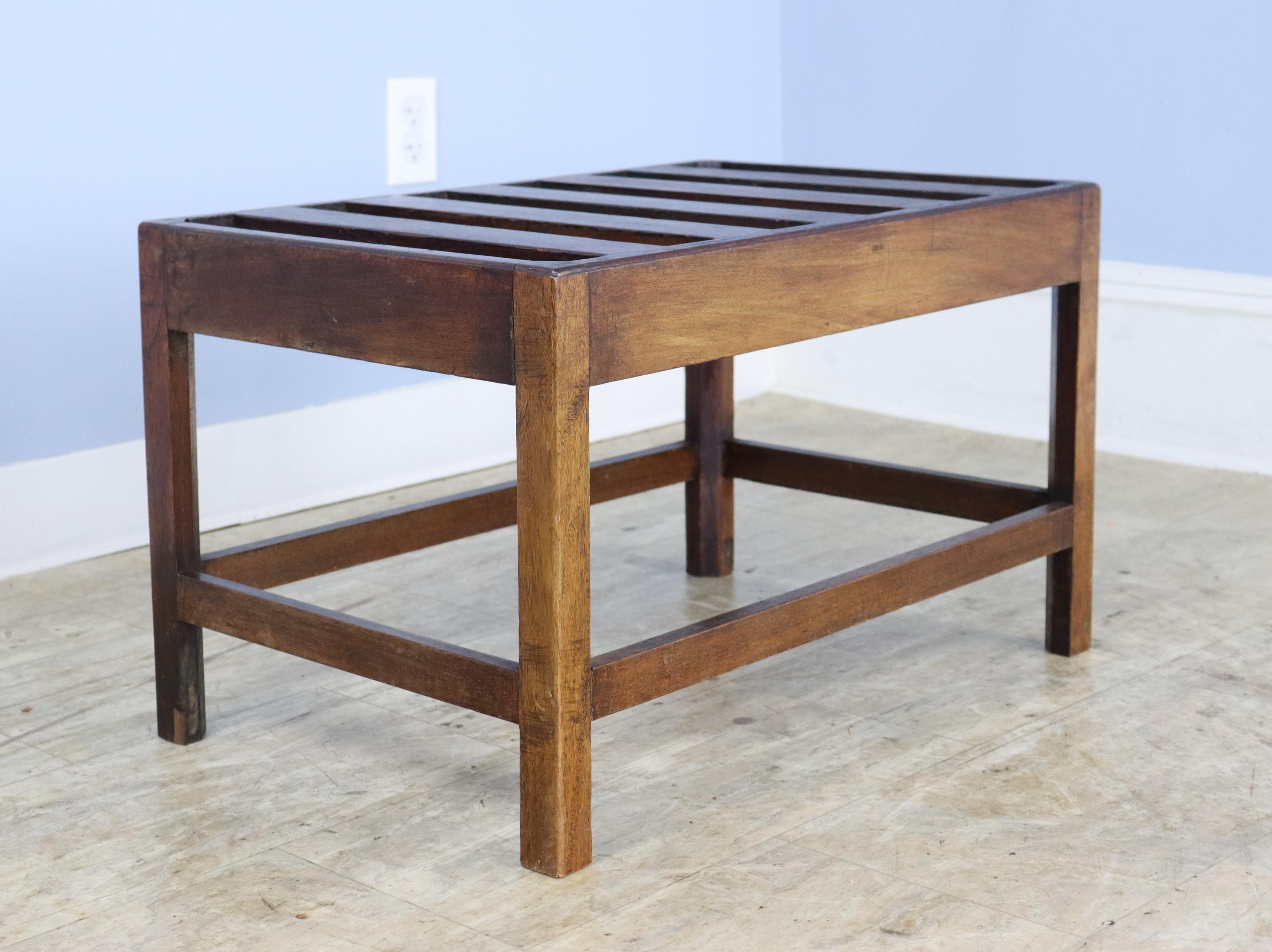 An elegant oak luggage rack for the guest room.  Your guests deserve it!