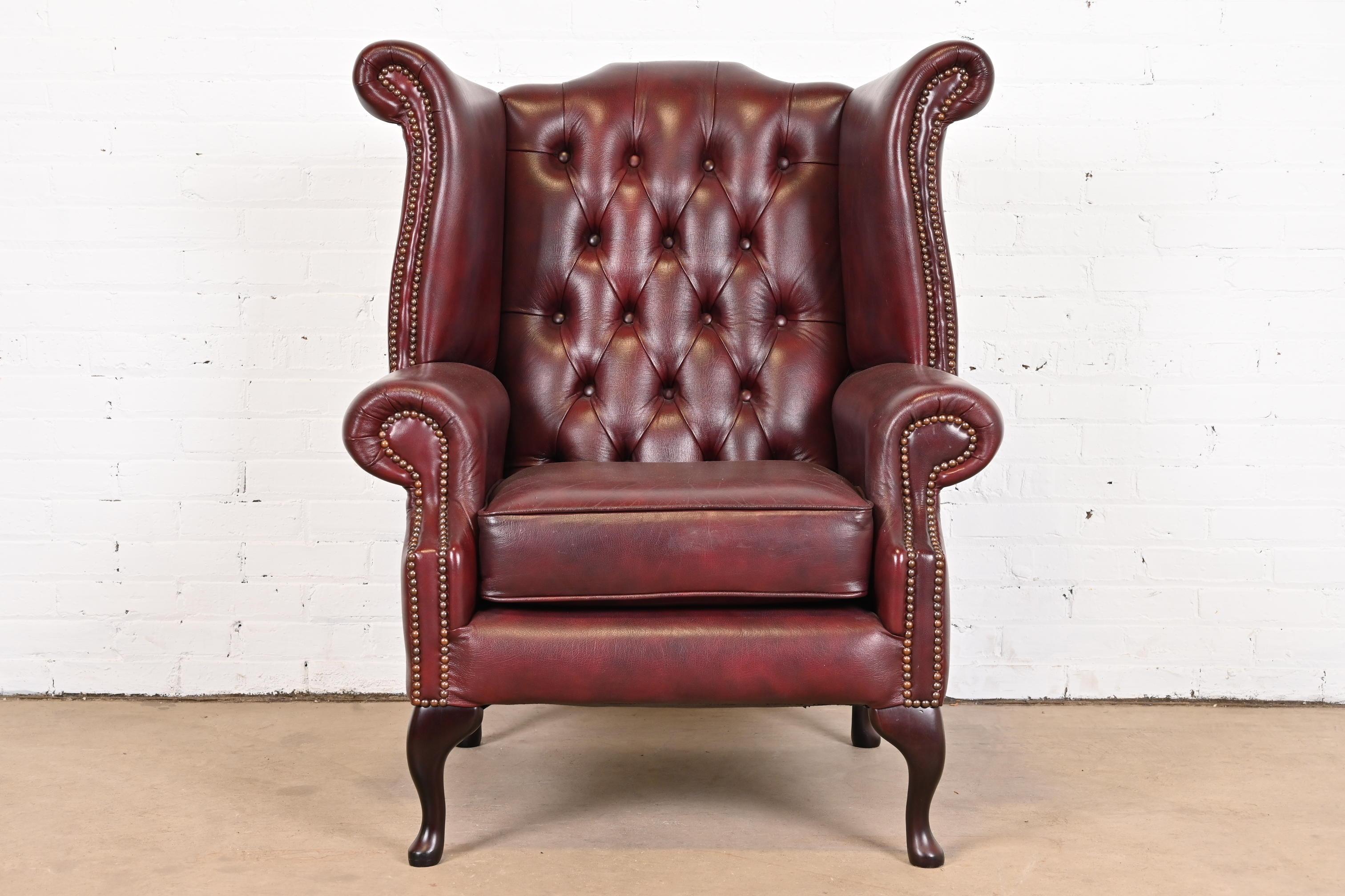 Vintage English Oxblood Leather Chesterfield Wingback Lounge Chair with Ottoman 10