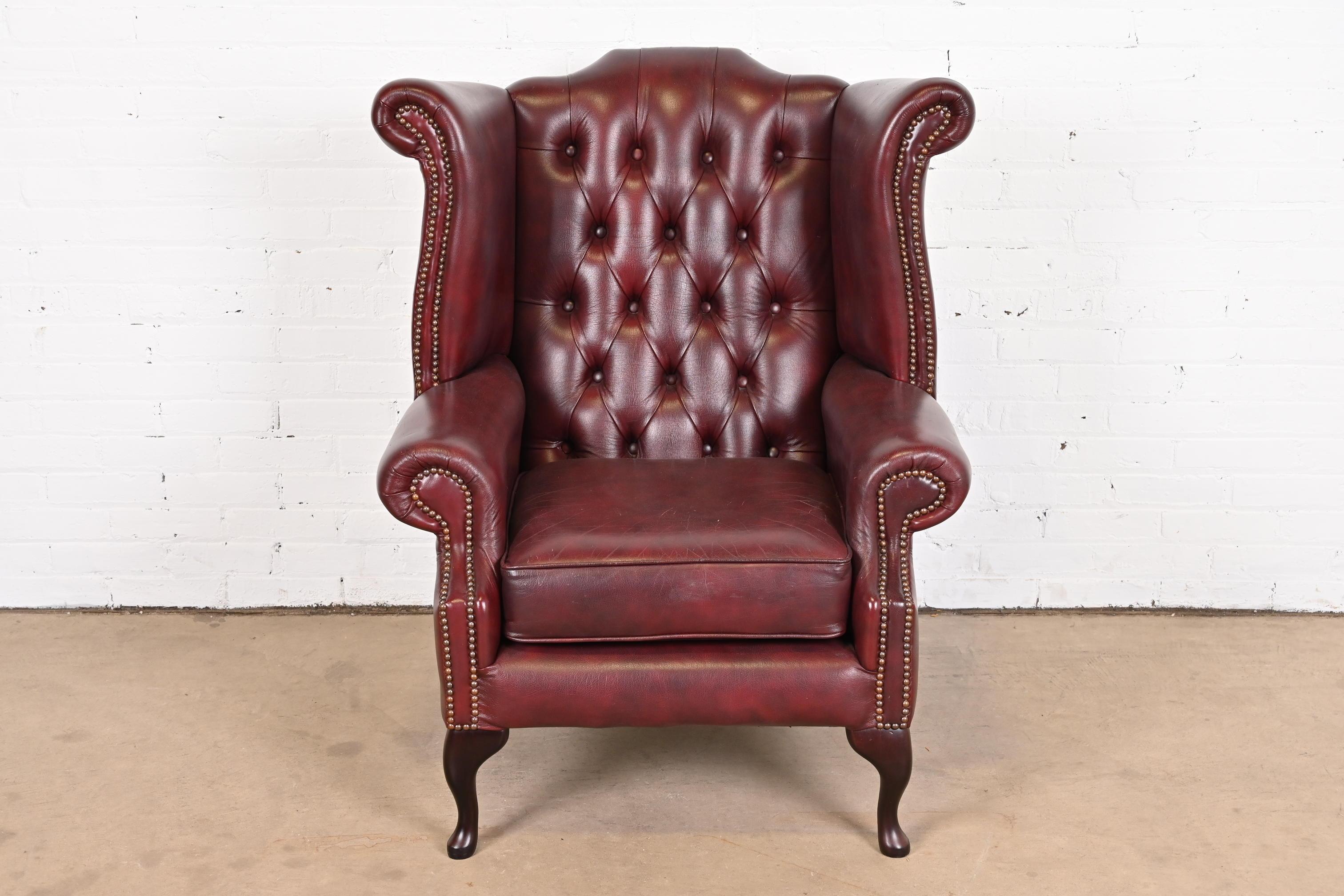 Vintage English Oxblood Leather Chesterfield Wingback Lounge Chair with Ottoman 11