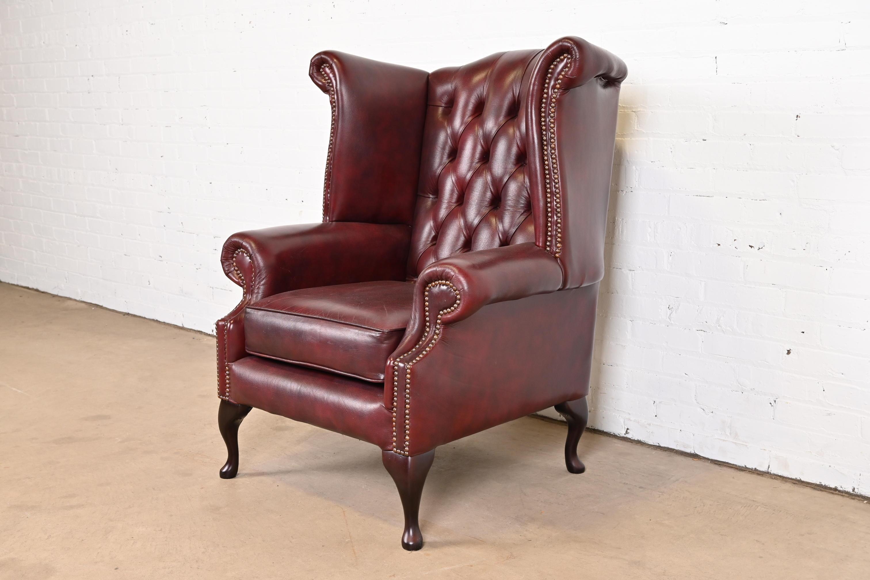 Vintage English Oxblood Leather Chesterfield Wingback Lounge Chair with Ottoman 12