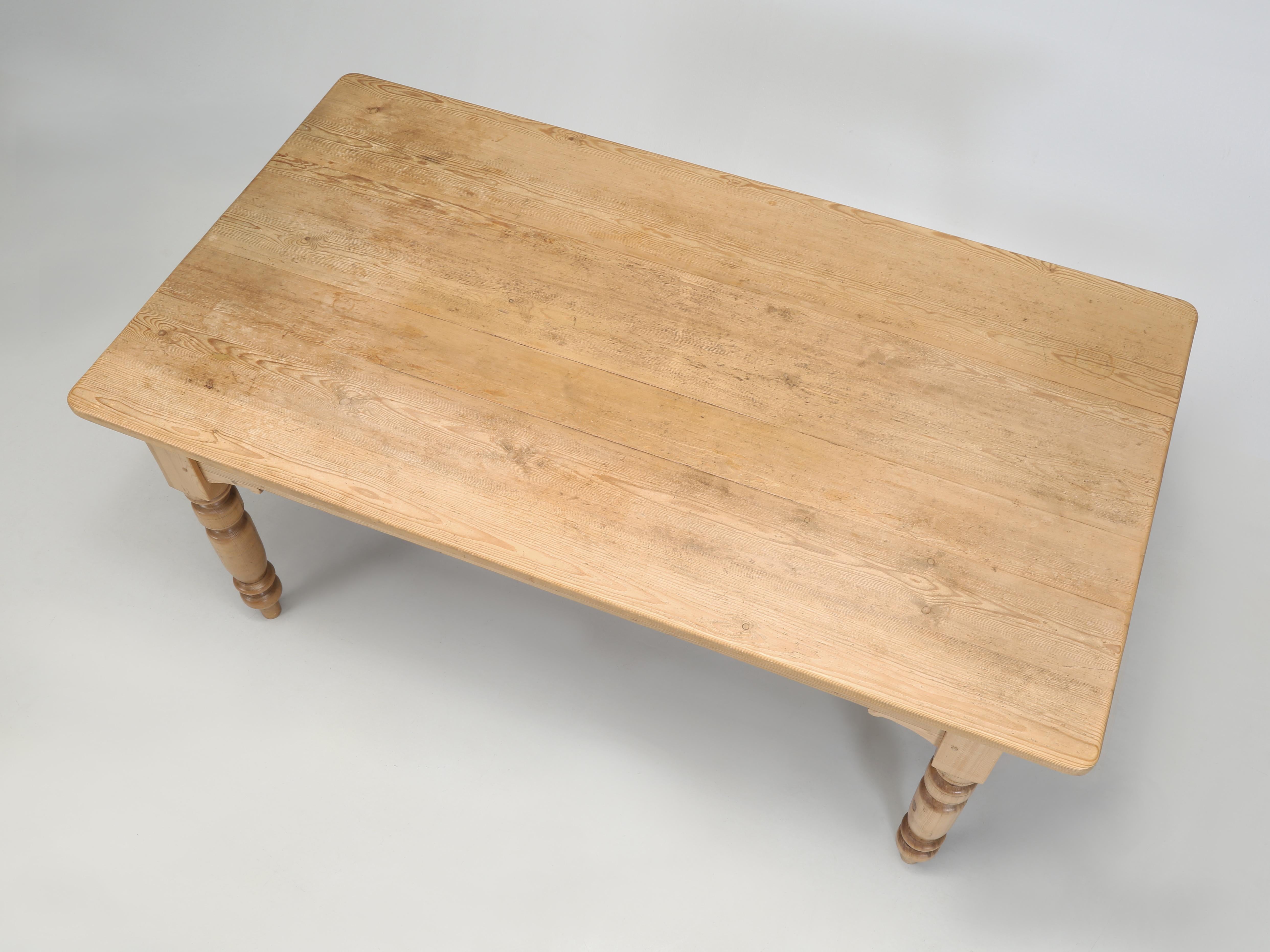 Originally imported by Vintage Pine and sold in Chicago is a beautifully constructed Pine Farm Table or Pine Kitchen Table made from reclaimed Pine lumber. Vintage Pine was  one of Chicago's premier shops for quality English Pine furniture years ago