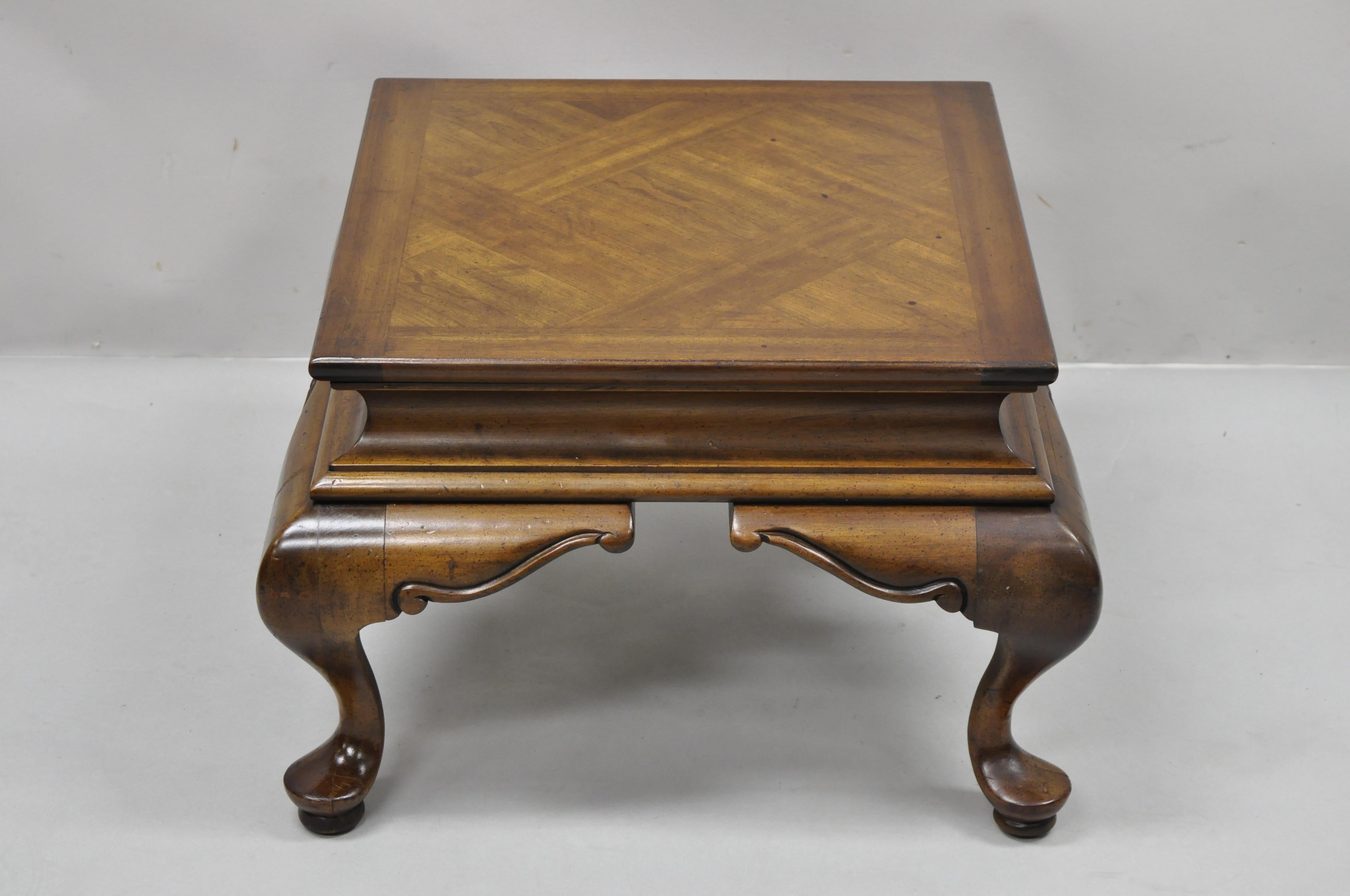 Vintage English Queen Anne low parquetry inlay pedestal stand side table. Item features solid wood construction, beautiful wood grain, distressed finish, shapely Queen Anne legs, quality American craftsmanship. Circa mid 20th century. Measurements: