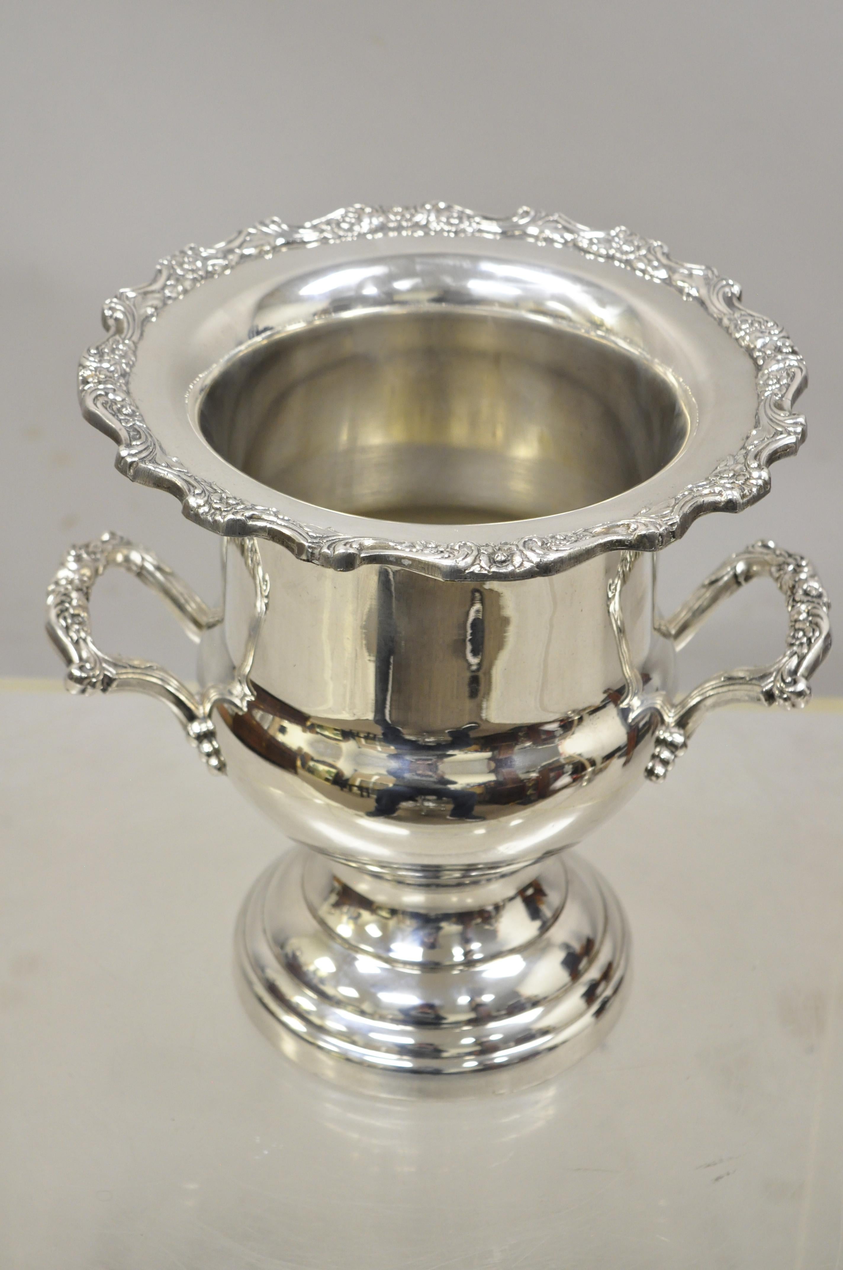 Vintage English Regency silver plate trophy urn twin handle champagne ice bucket, circa mid-20th century. Measurements: 10.5
