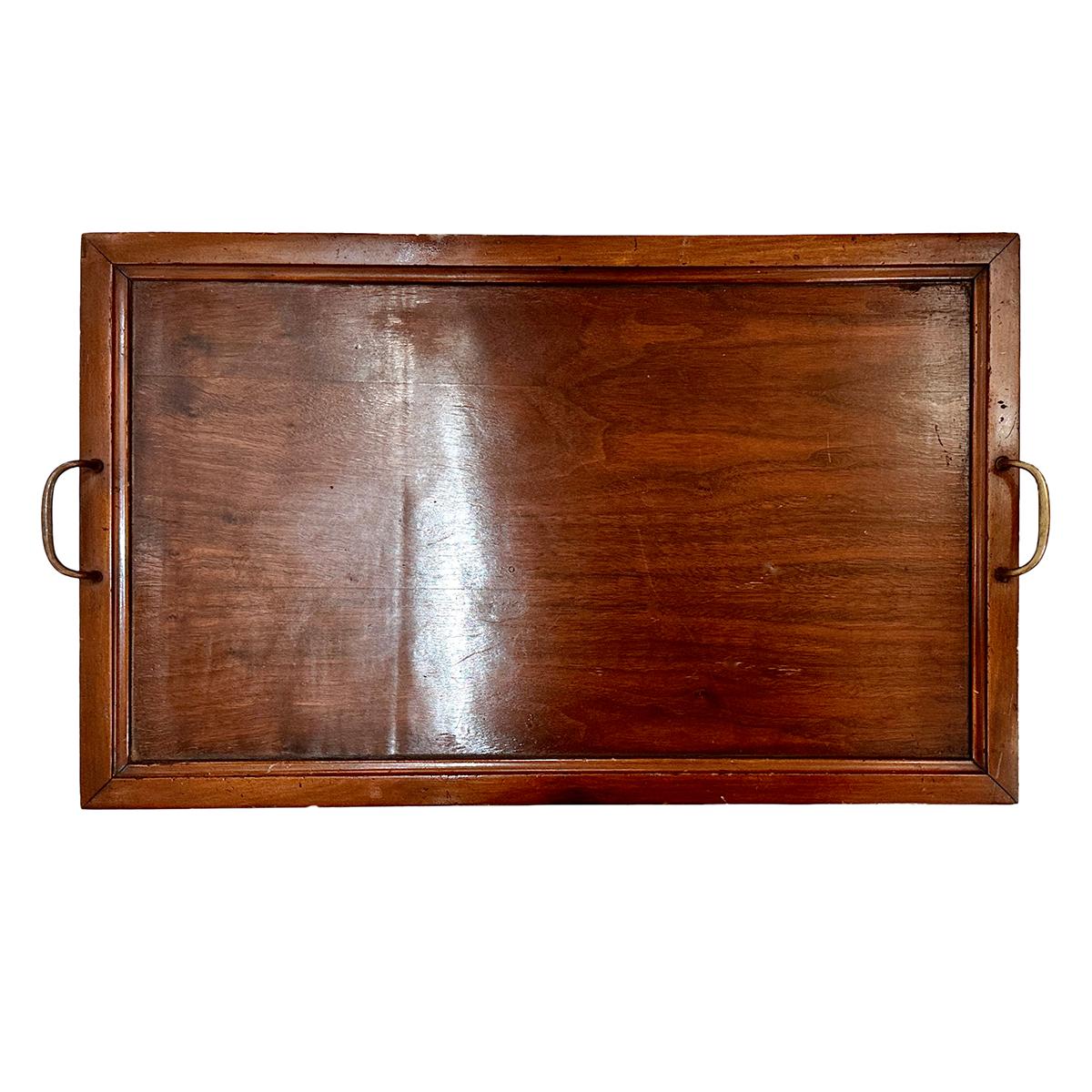 A circa 1940's English wood tray with brass handles.

Measurements:
Height: 2