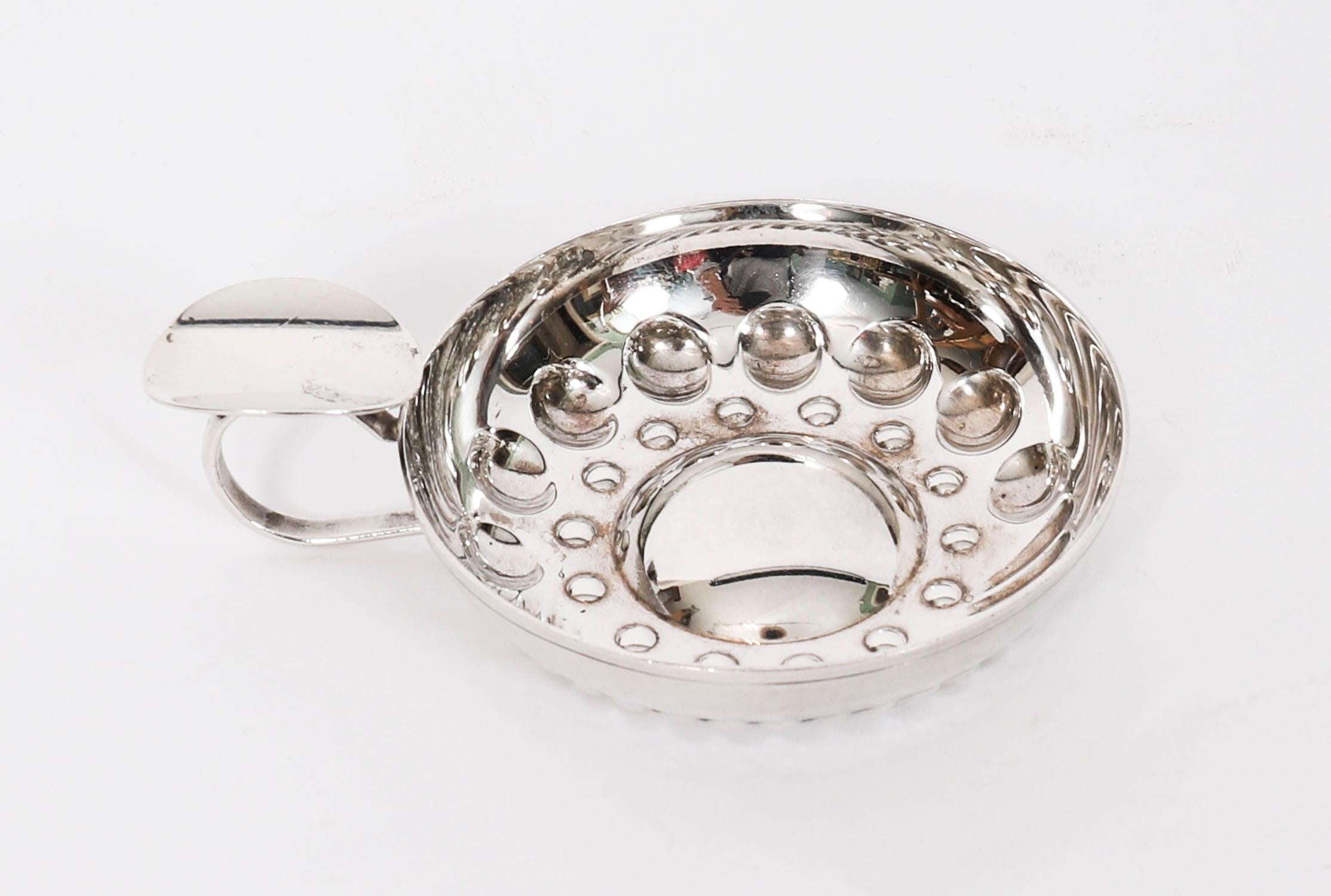 This is wonderful English Vintage silver plated tastevin, Circa 1950 in date.

A tastevin is a shallow, silver cup used for tasting wine, traditionally carried by sommeliers and winemakers, especially in dark cellars. The name comes from the French
