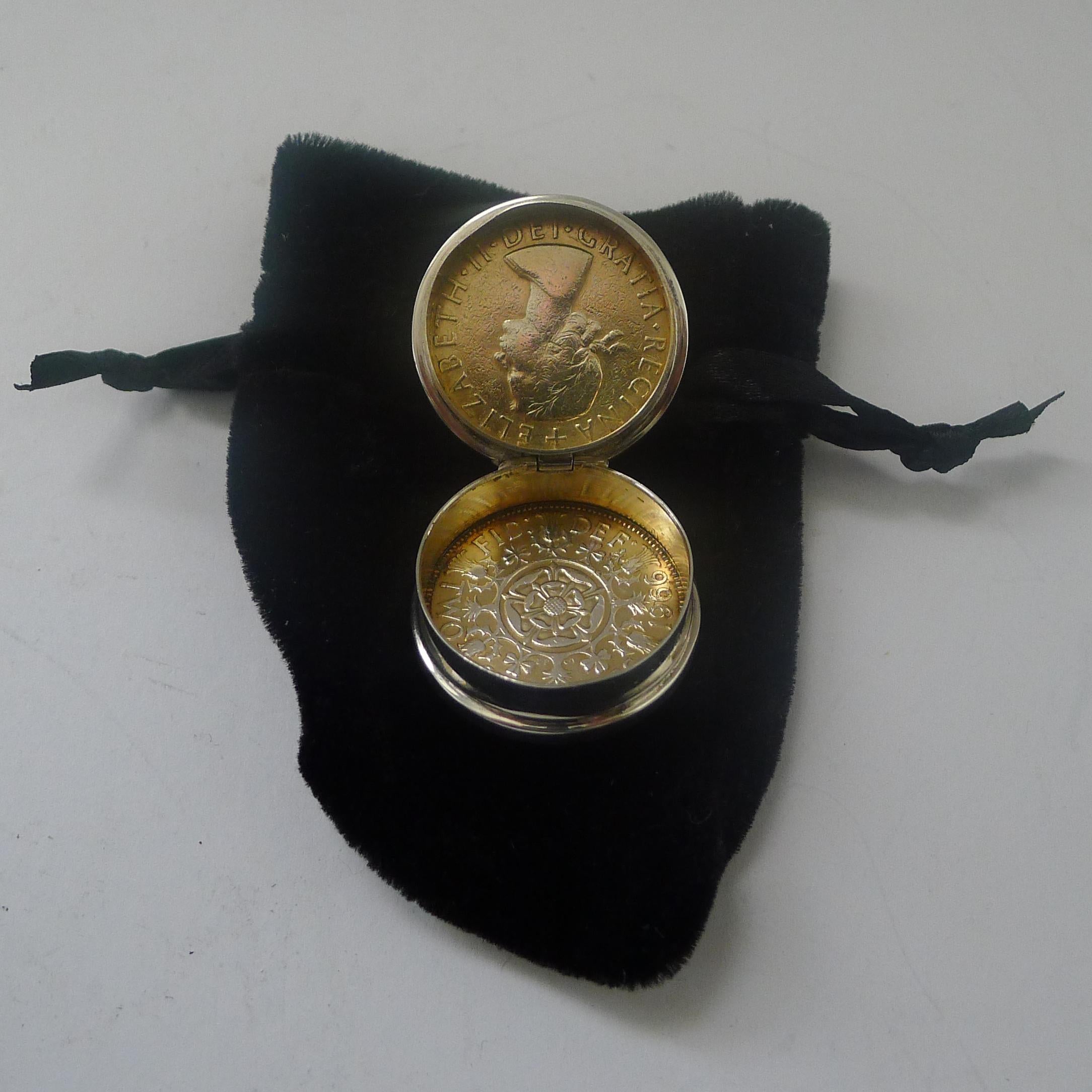 A most unusual English pill box by the creme de la creme of London retailers, Asprey of Bond Steet.

The box with hinged lid and base created from an English two old 