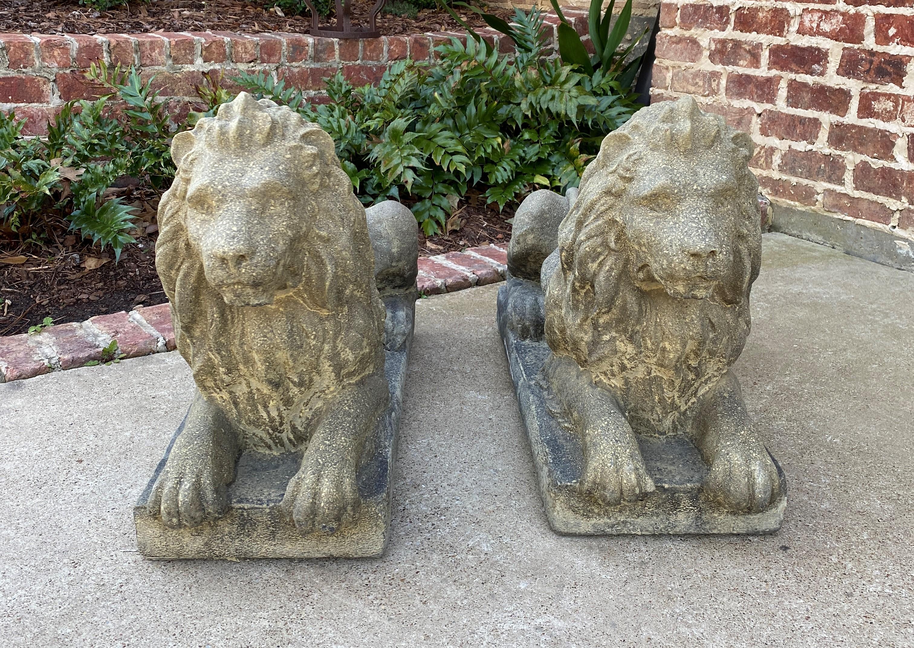 Vintage pair English cast stone Recumbent lion statues~~Garden Figures~~Statuary~~Architectural Yard Decor

Original aged patina

 The perfect accent piece or focal point in an entryway, garden, yard, flower bed, or sunroom 

 Each lion is 21