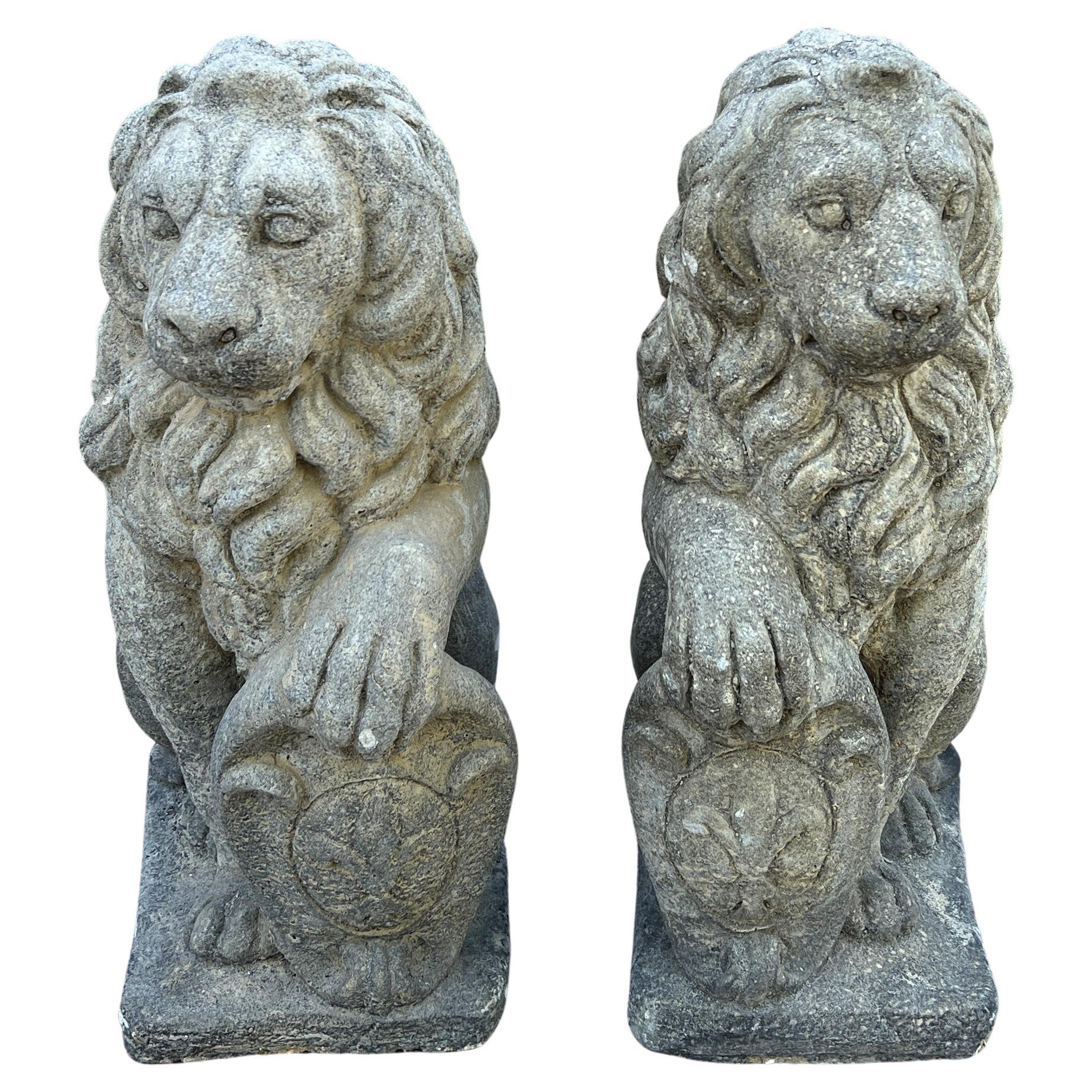 Pair Cast Hard Stone Classical Seated Lion Statues in Bronzed Finish