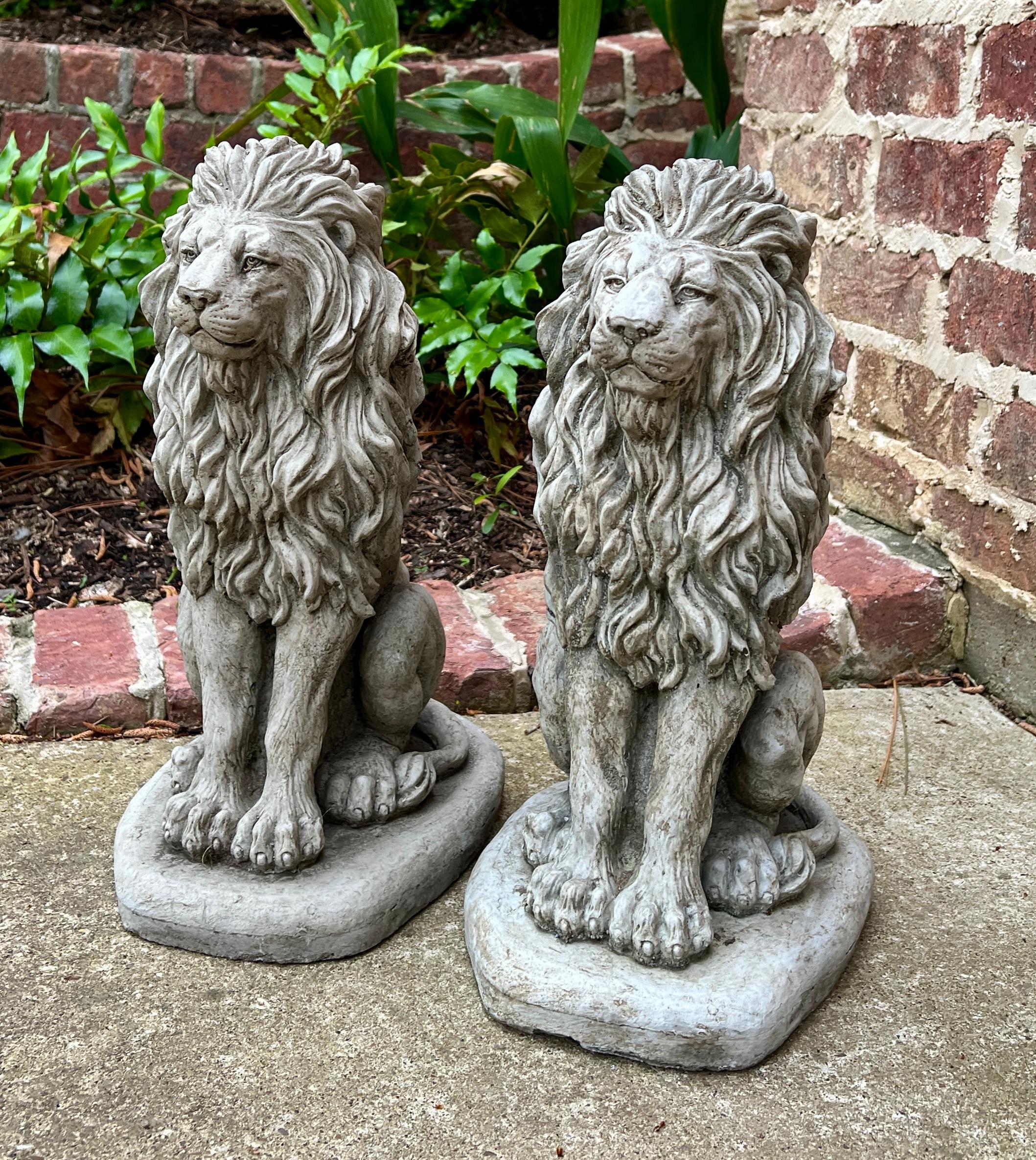 Vintage English Cast Stone Statues PAIR LIONS Garden Figures Yard Decor

Original aged patina sitting on oval base

The perfect accent piece or focal point in an entryway, garden, yard, flower bed, or sunroom

Each lion is 16