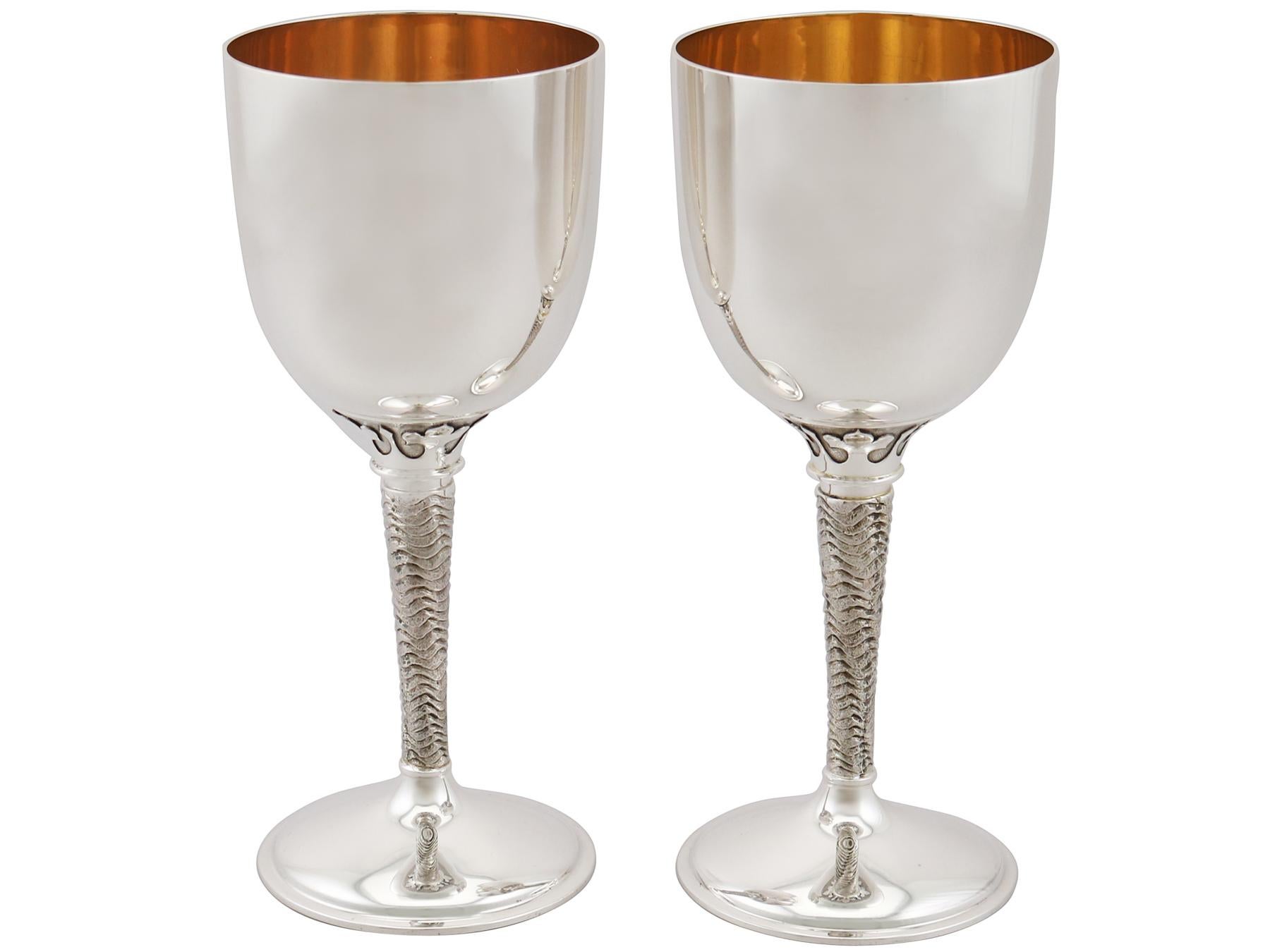 An exceptional, fine and impressive pair of vintage English sterling silver 'Bristol 600' goblets; an addition to our range of wine and drink related silverware.

These exceptional vintage silver goblets, in sterling standard, have a plain