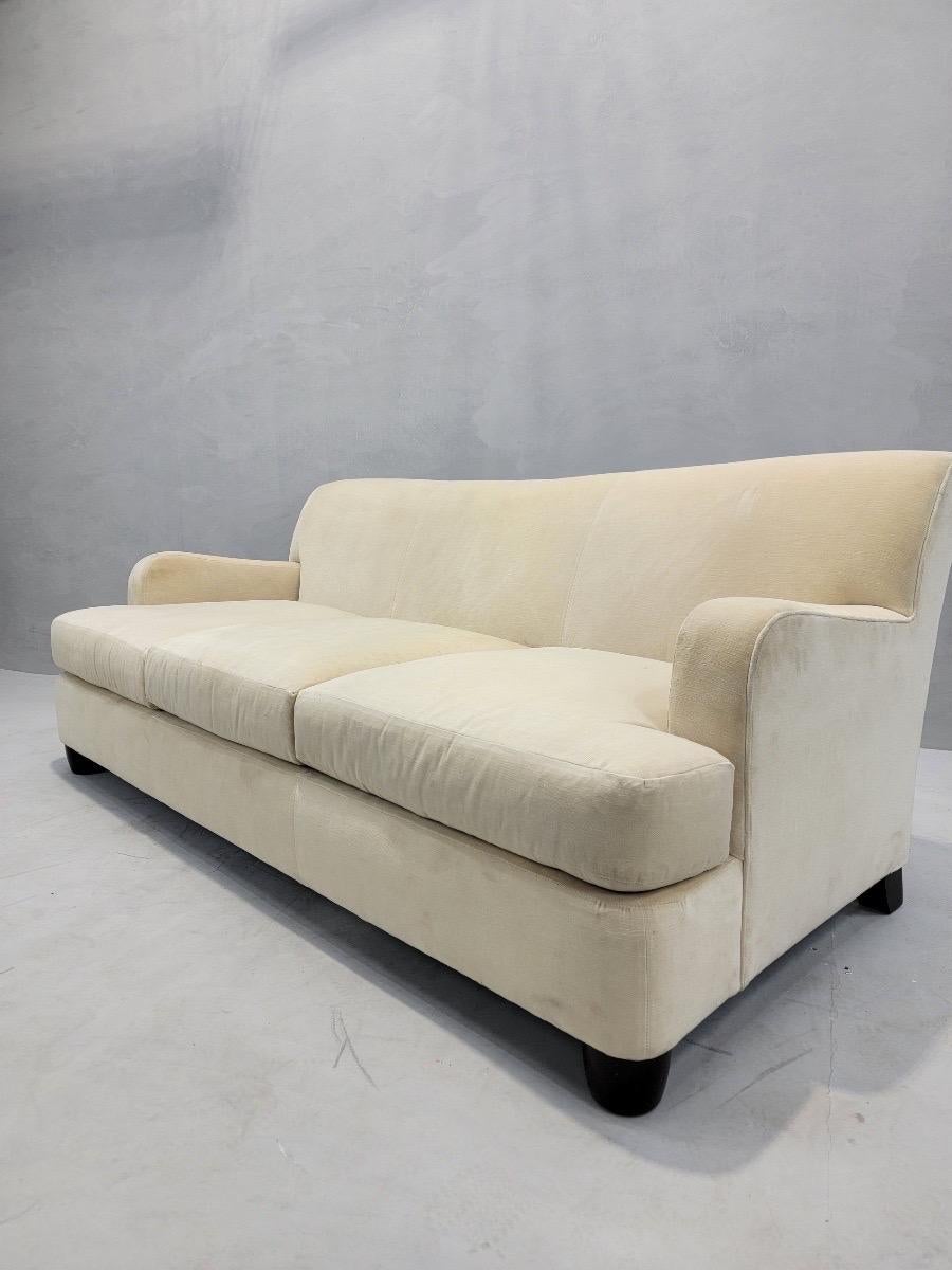 Vintage English Style Sofa by Barbara Barry Oval Collections For Henredon

We are offering this wide English-style rolled arm, three seat sofa in its original plush cream fabric. It has plenty of room for your family or for a large waiting room.