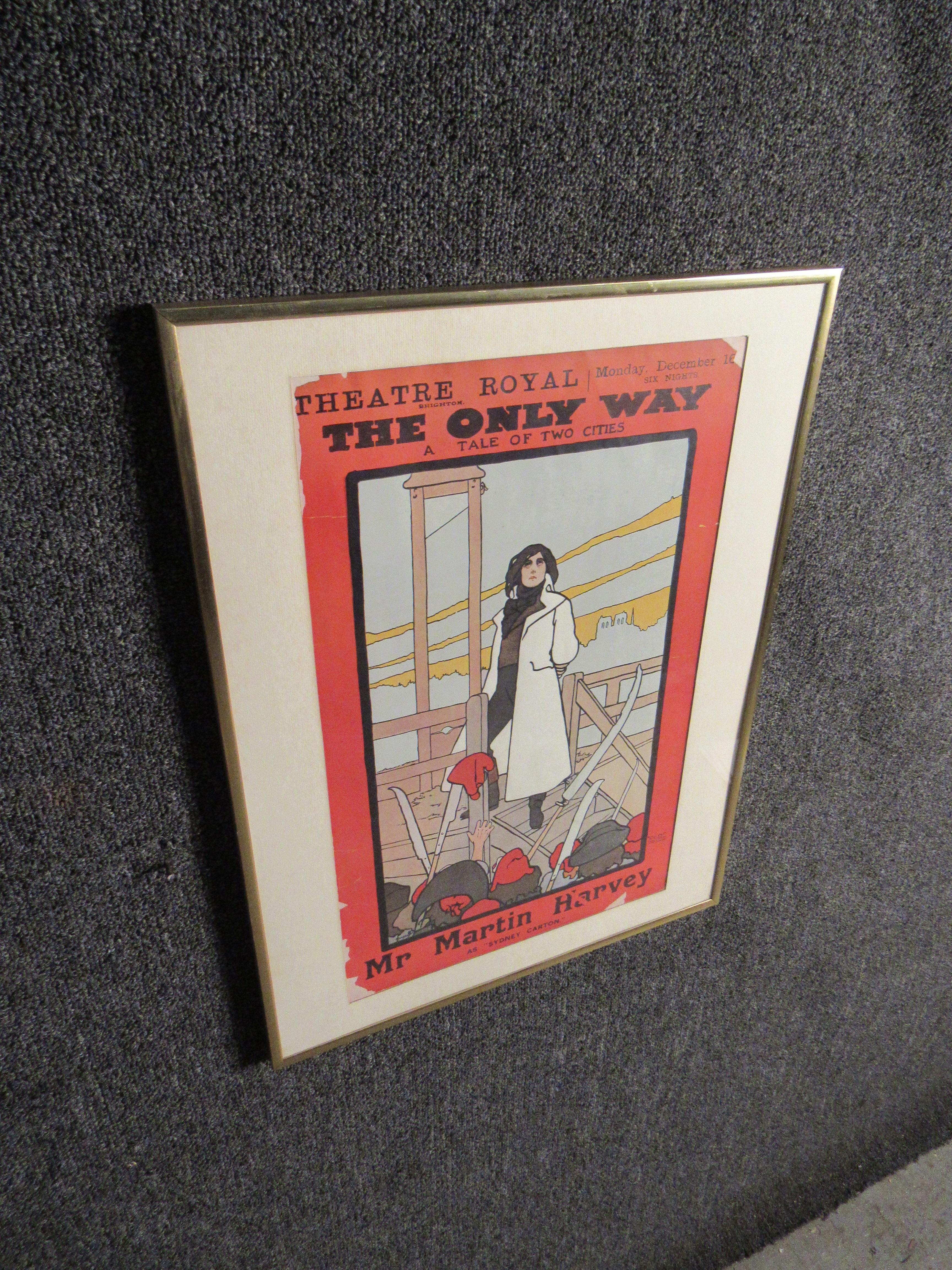 Bring home iconic early 20th century decor with this framed vintage playbill. Illustrated by renowned artist and Englishman John Hassall in collaboration with the famed printmakers of David Allen & Sons for the 1899 production of 