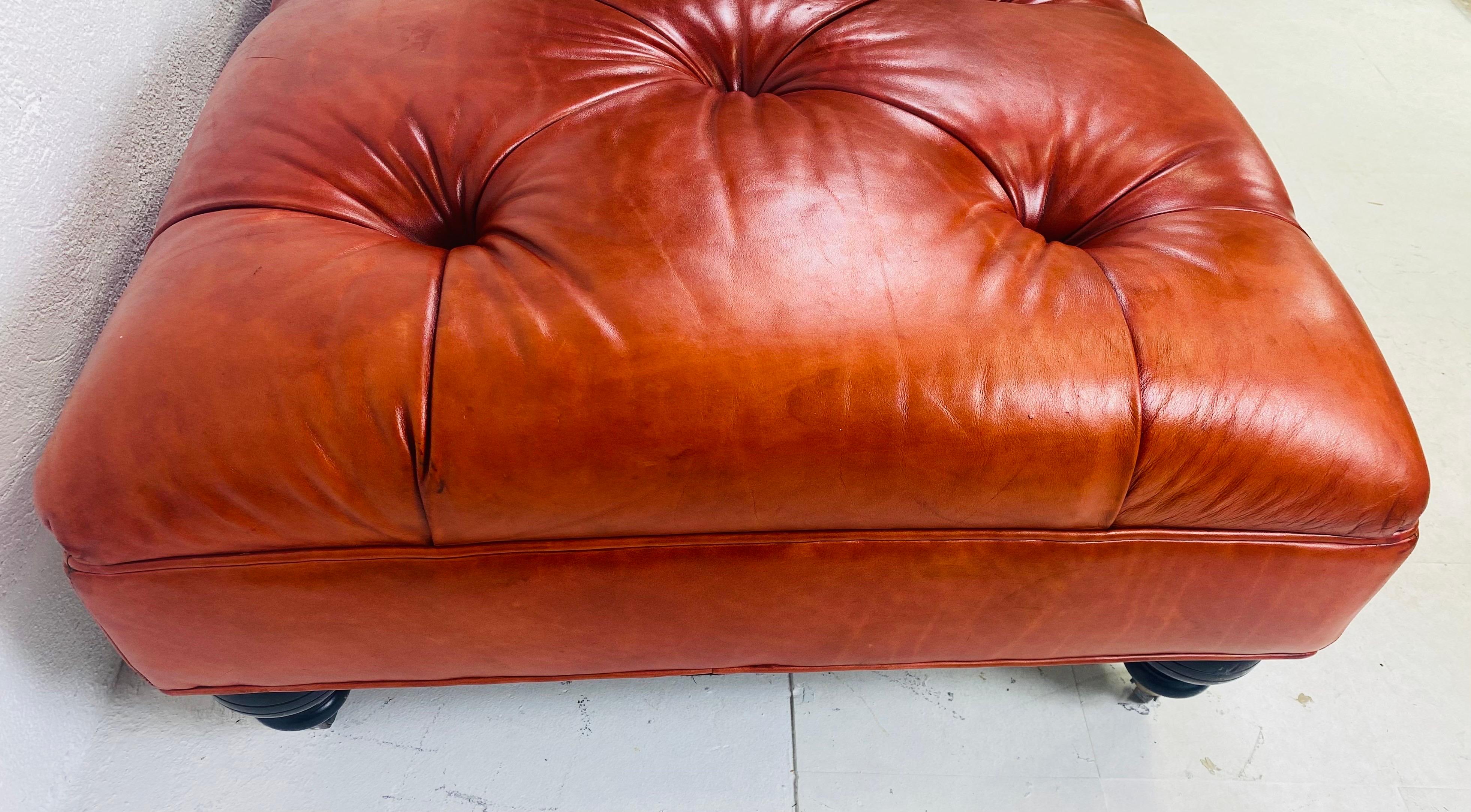 Edwardian Vintage English traditional style tufted leather ottoman. For Sale