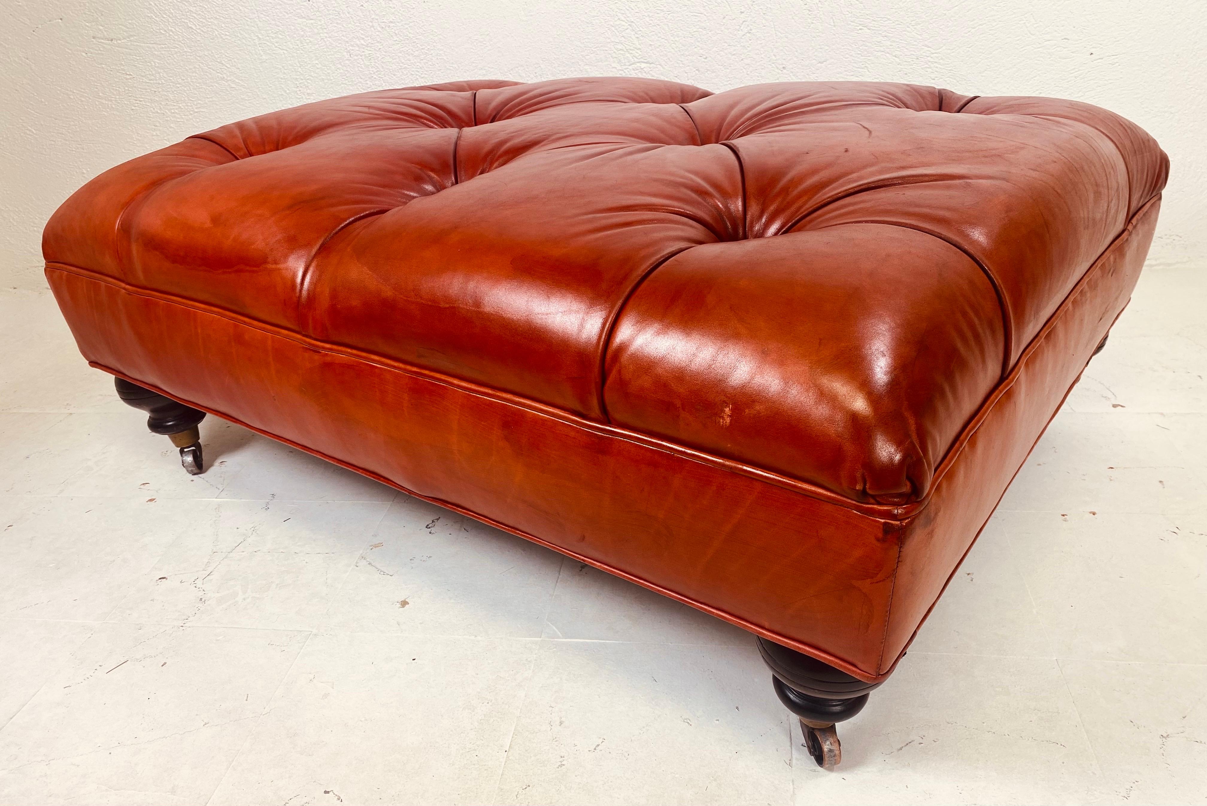 Vintage English traditional style tufted leather ottoman. For Sale 1