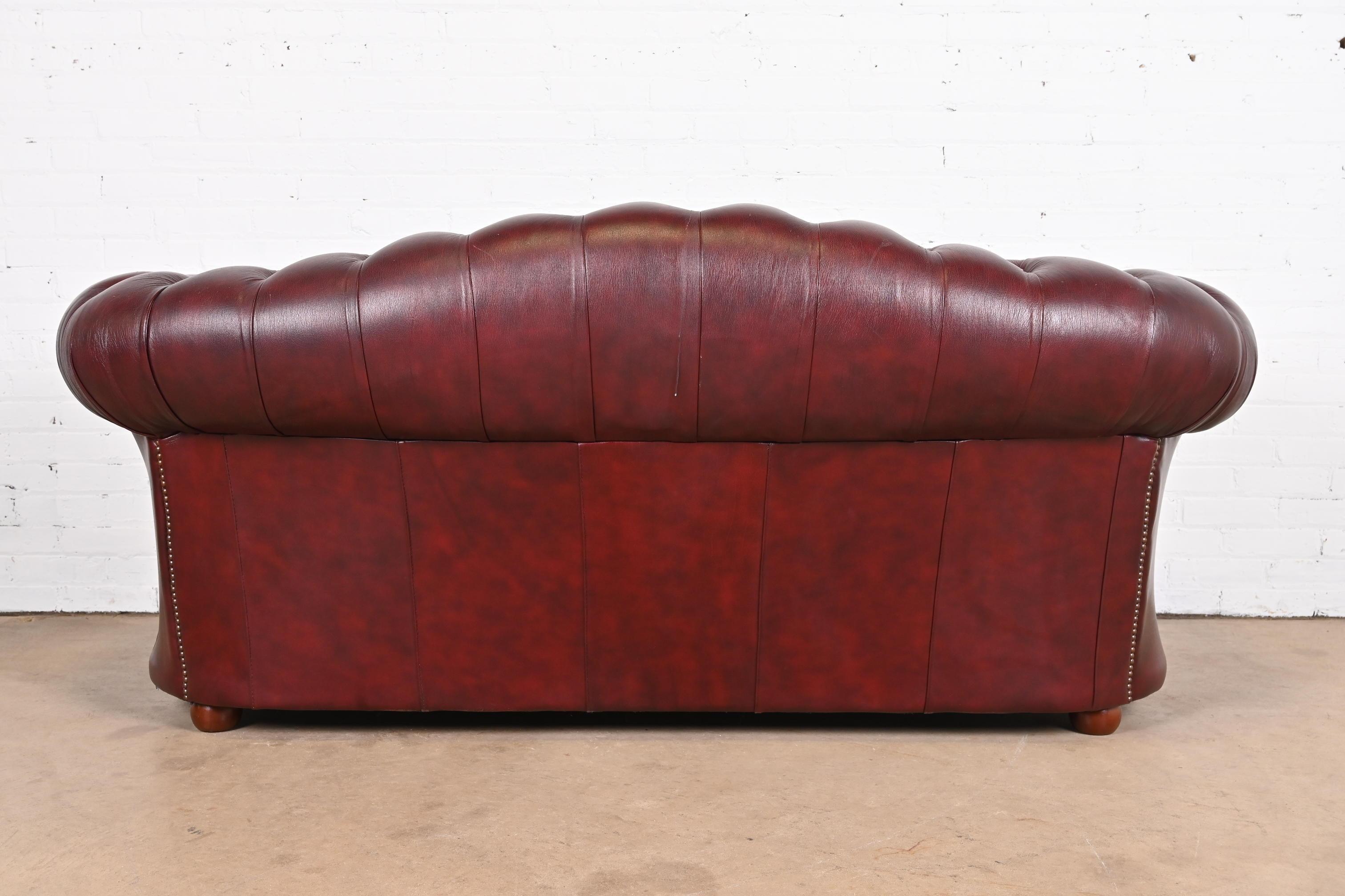 Vintage English Tufted Oxblood Leather Camelback Chesterfield Sofa 7