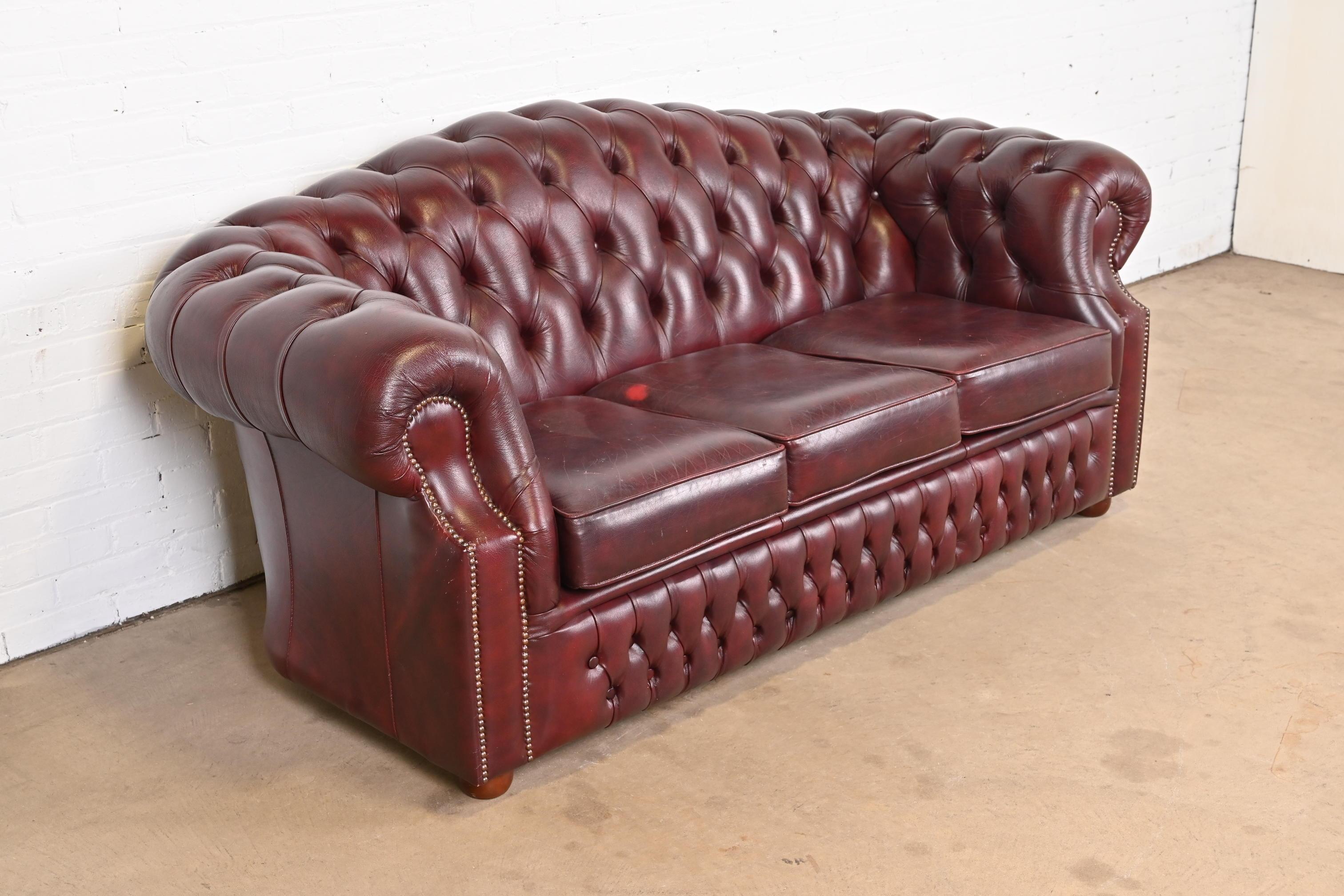 Vintage English Tufted Oxblood Leather Camelback Chesterfield Sofa 1