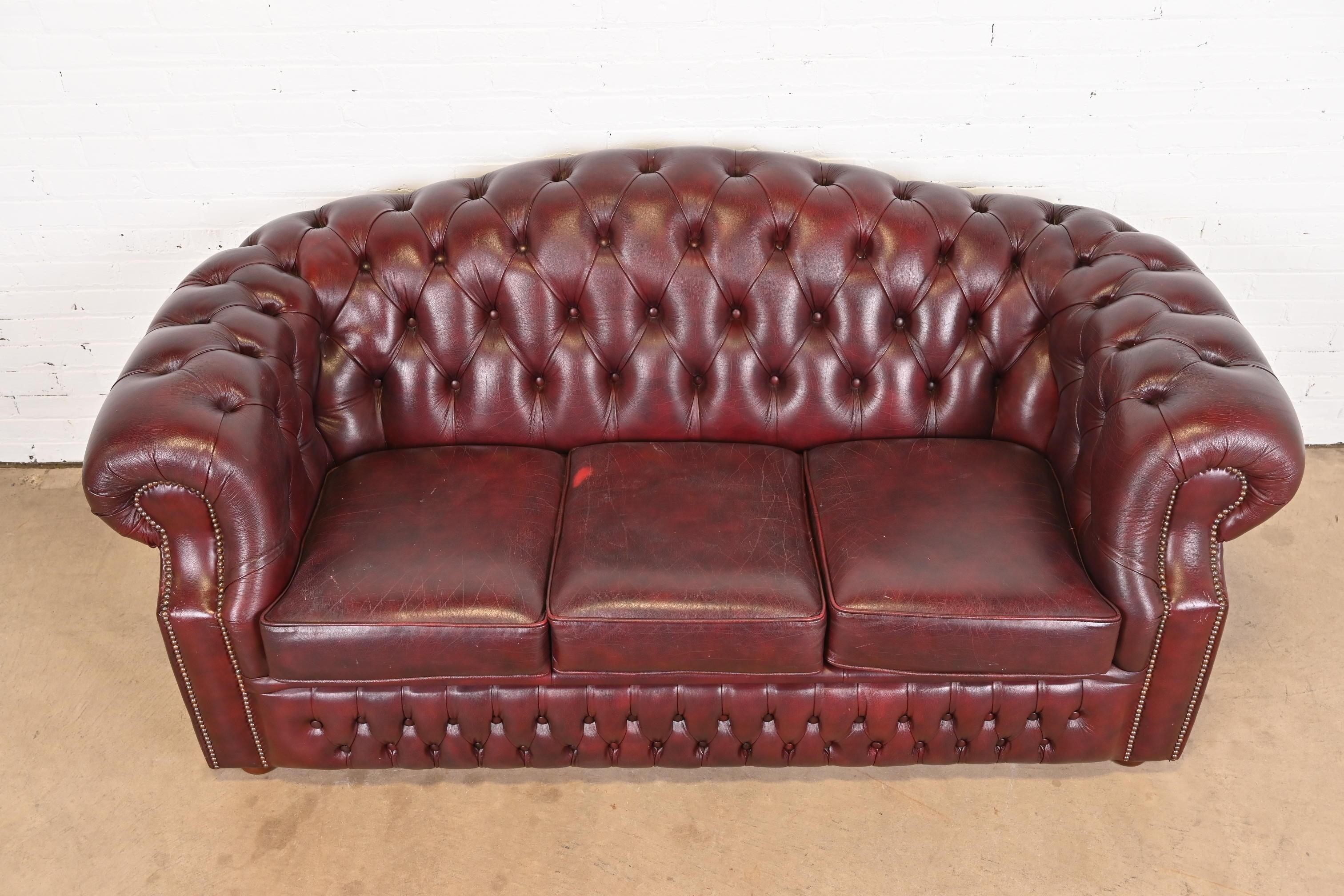 Vintage English Tufted Oxblood Leather Camelback Chesterfield Sofa 4