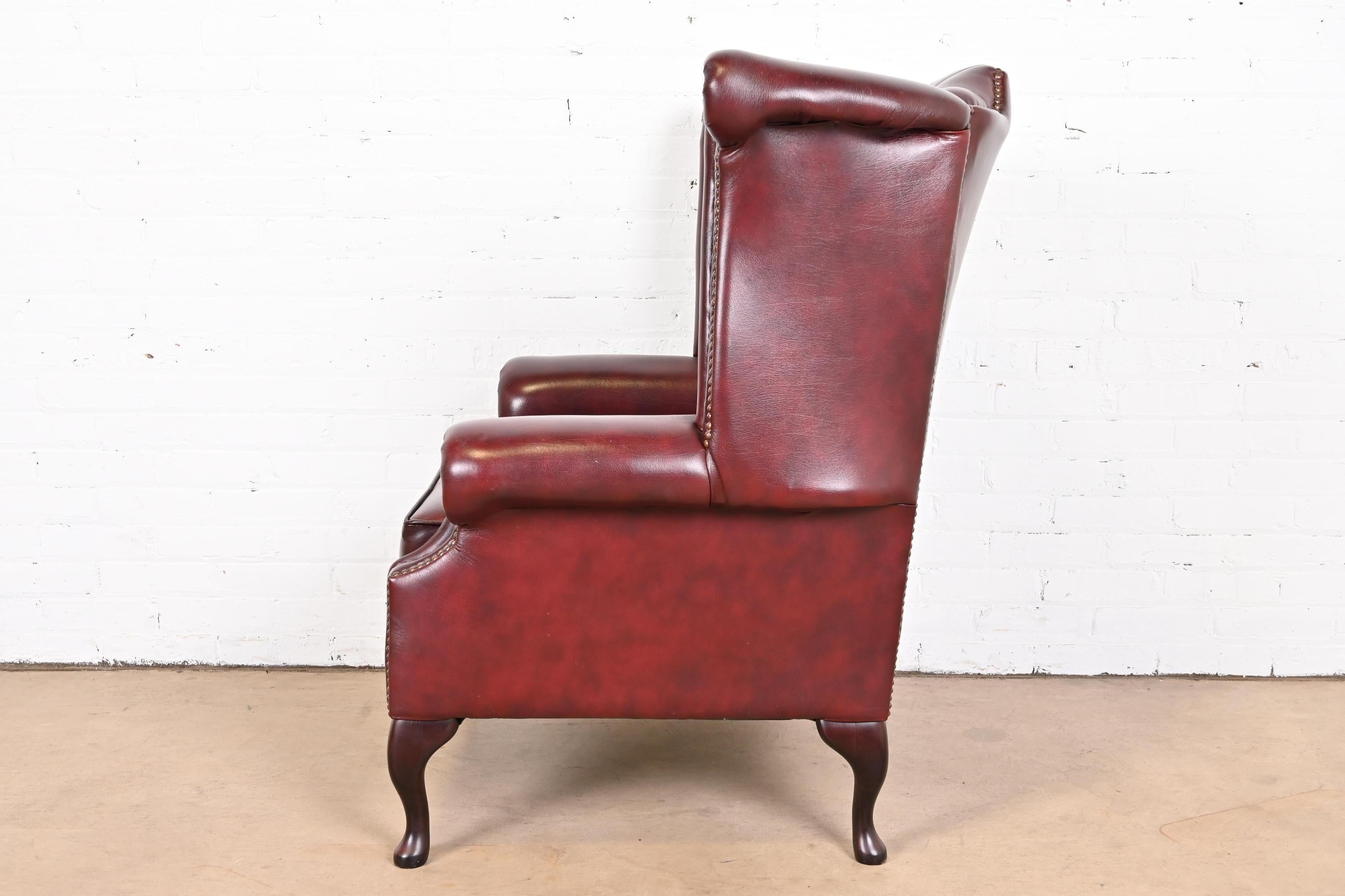 Vintage English Tufted Oxblood Leather Chesterfield Wingback Lounge Chair 6