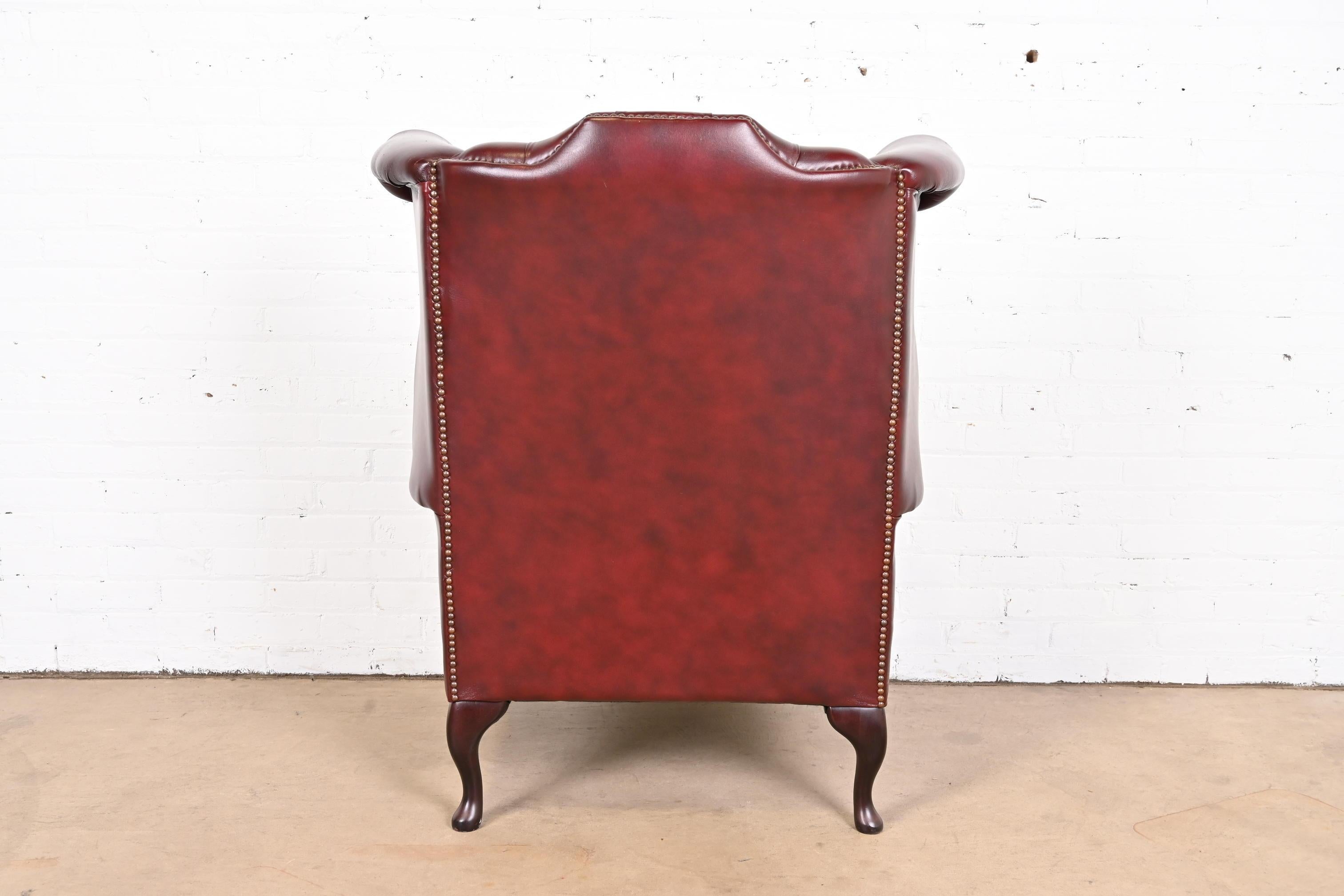 Vintage English Tufted Oxblood Leather Chesterfield Wingback Lounge Chair 7