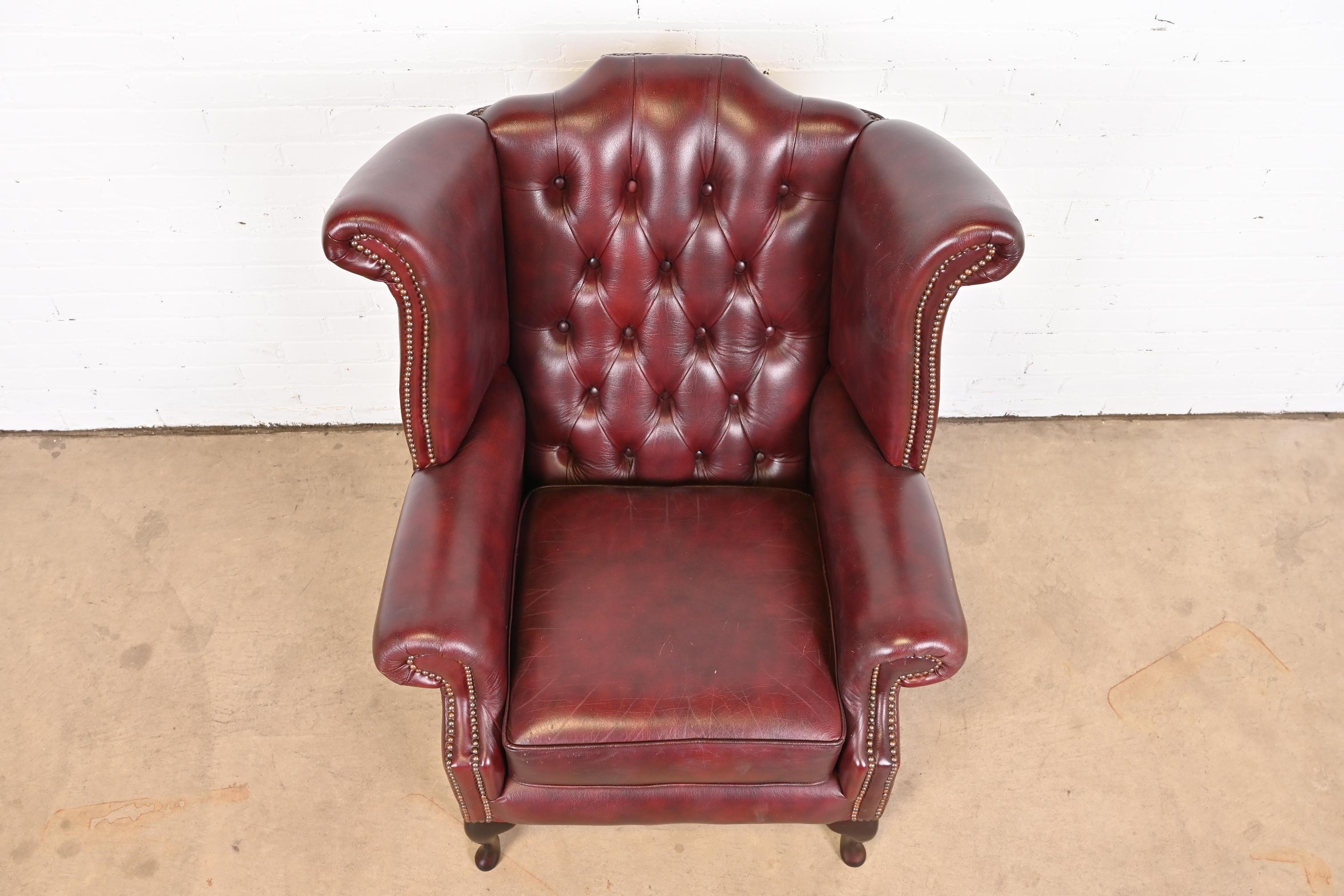 20th Century Vintage English Tufted Oxblood Leather Chesterfield Wingback Lounge Chair