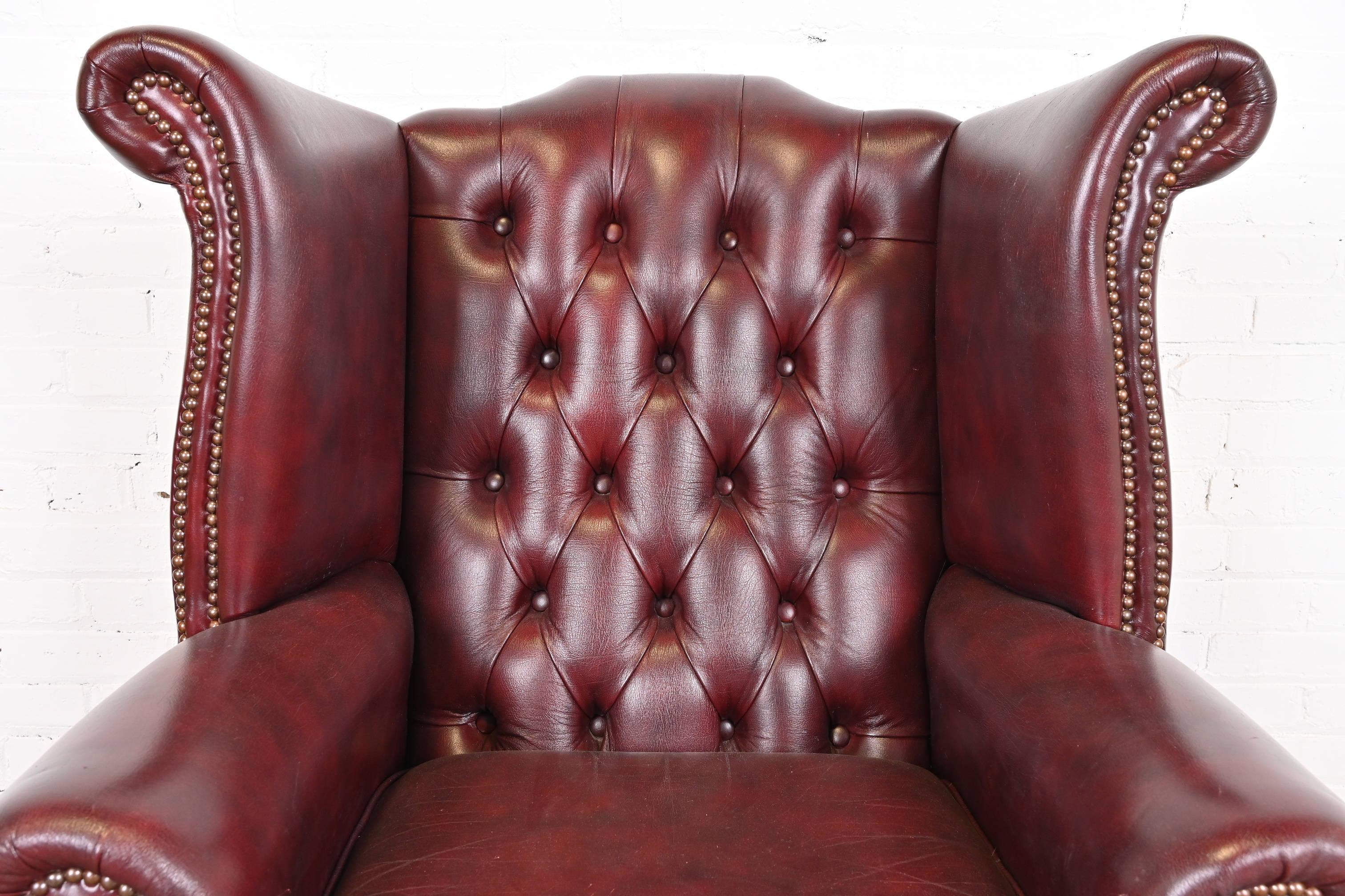 Brass Vintage English Tufted Oxblood Leather Chesterfield Wingback Lounge Chair