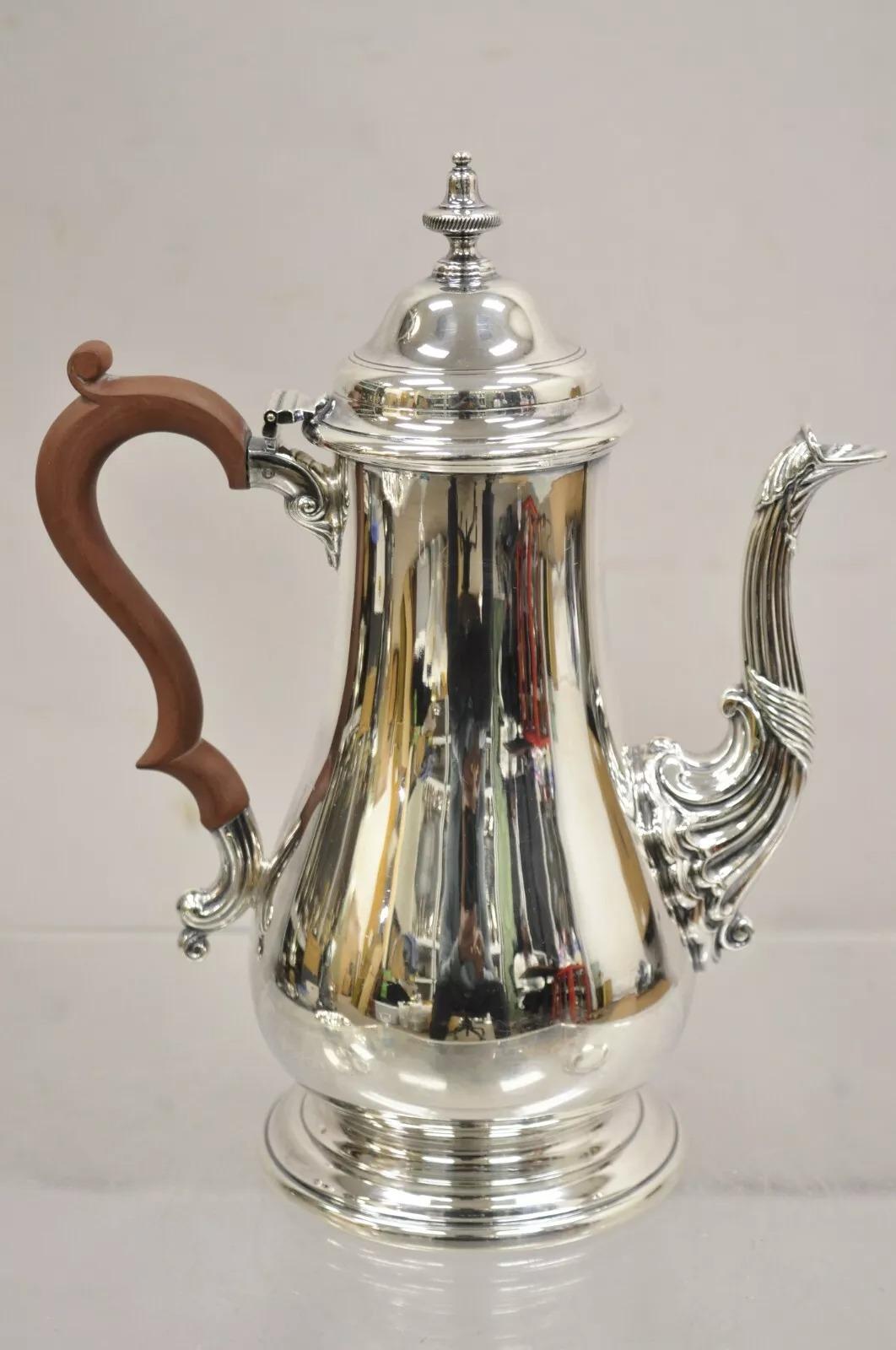 Vintage English Victorian Silver Plated Coffee Pot Tea Pot w/ Wooden Handle. Circa Mid 20th Century. Measurements: 11 H x 9