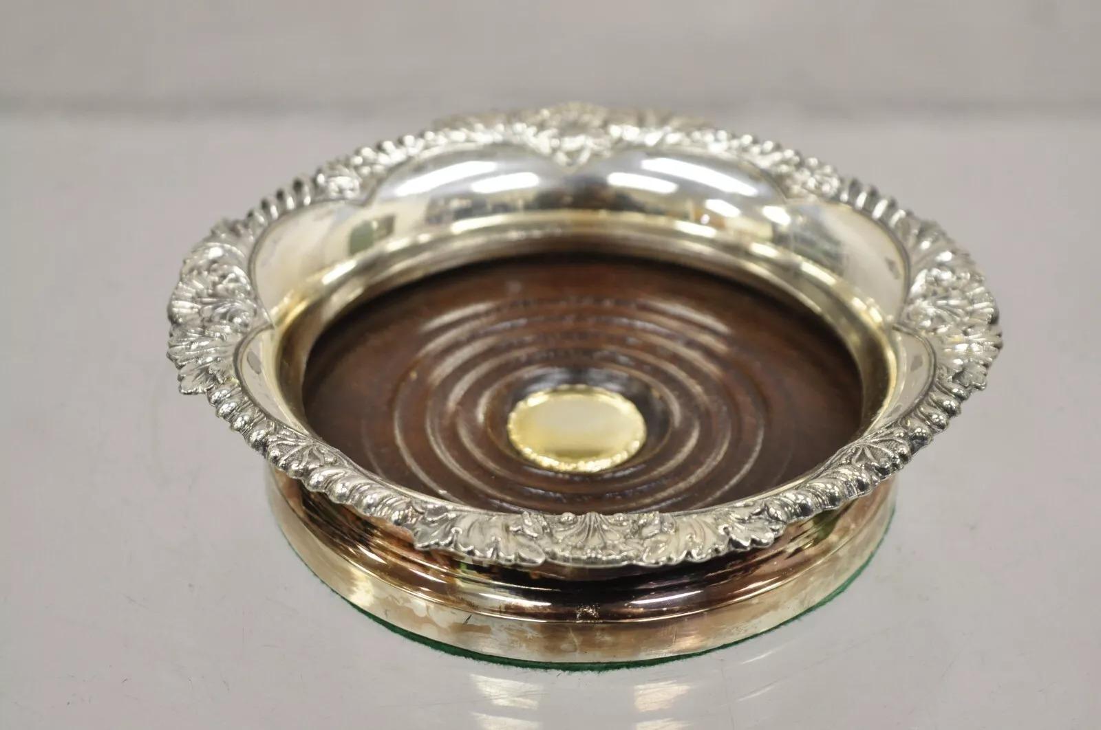Vintage English Victorian Silver Plated Copper Wine Bottle Coaster. Circa Mid 20th Century. Measurements: 1.5
