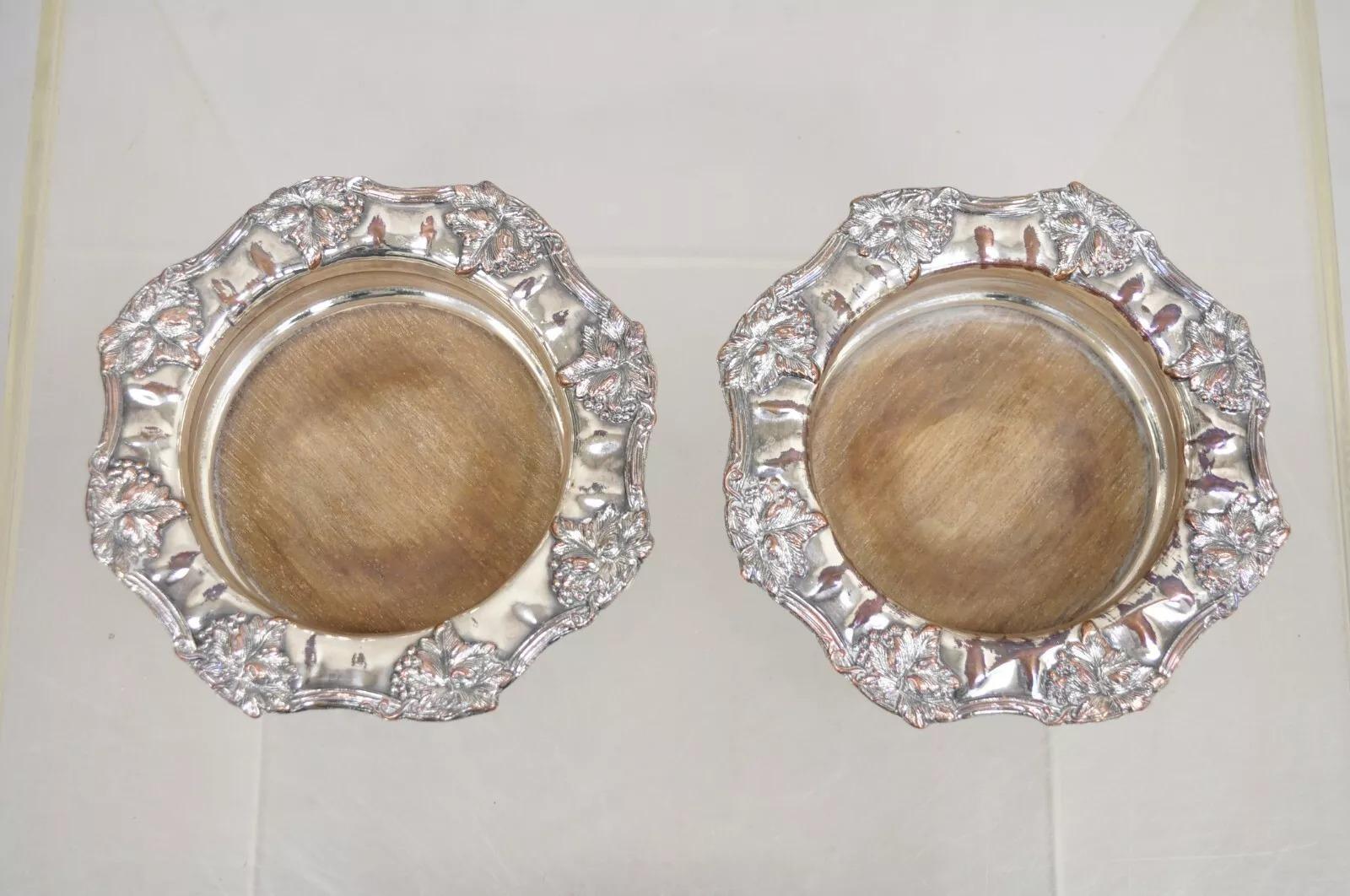 Vintage English Victorian Silver Plated Repousse Wine Coasters - a Pair. Circa Mid 20th Century. Measurements: 1.5