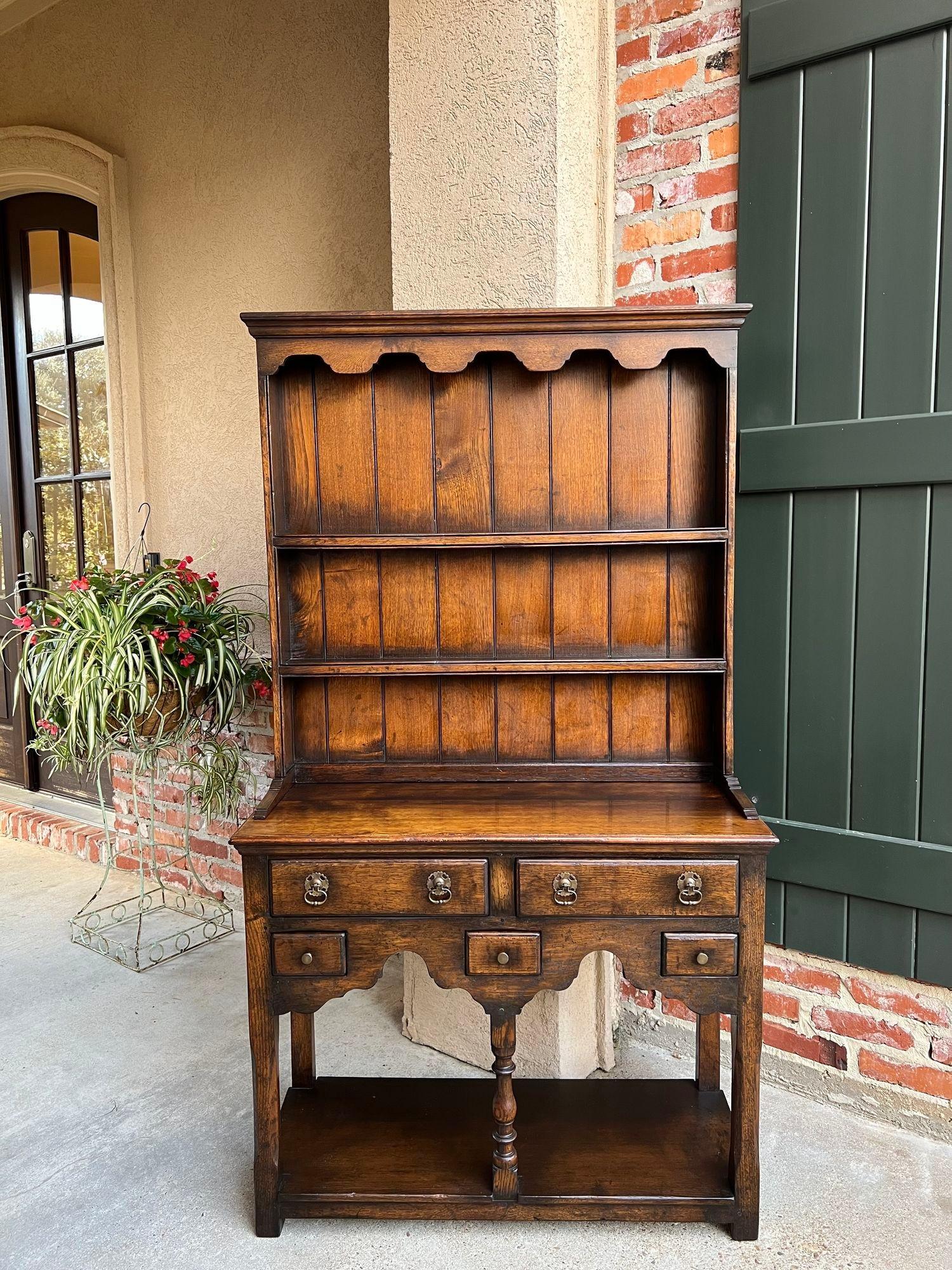 Vintage English Welsh Dresser PETITE Sideboard Oak Farmhouse Kitchen Cabinet.

Direct from England, a charming vintage English “Welsh Dresser” or sideboard, ALWAYS a classic that blends perfectly with every style, and provides an abundance of
