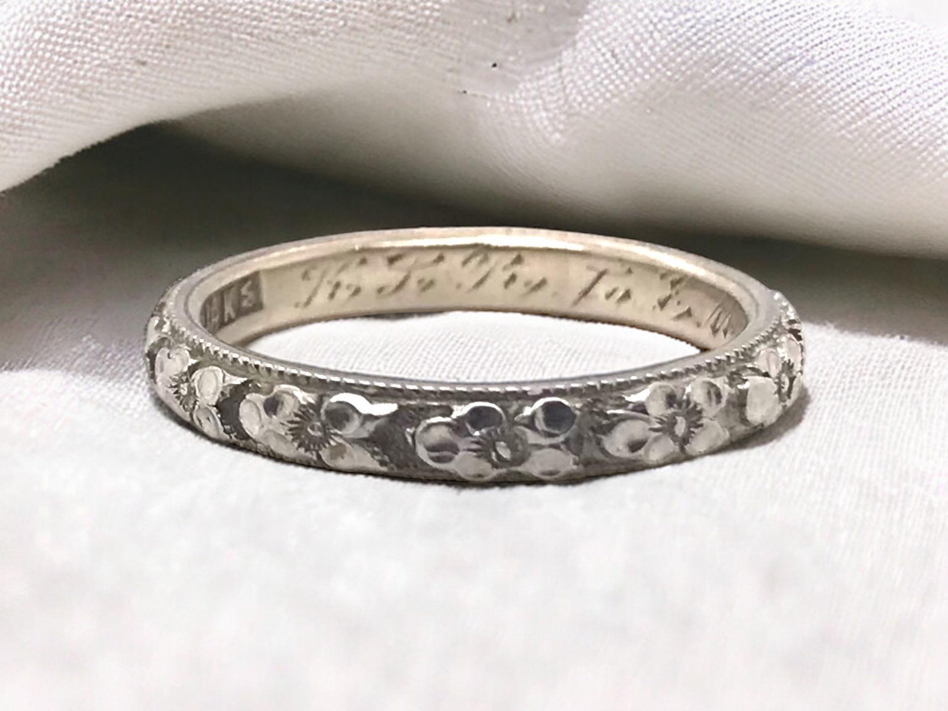 Lovely piece of vintage history!
Engraved Inside: KLR to EAG

Ring Details:
Material: 14K White Gold
Shank Width: 2.8mm 
Height: 1.8mm
Weight: 2.9 Grams
Finger Size: 5.5
Sizing Options Available 

Item: 768TMV1