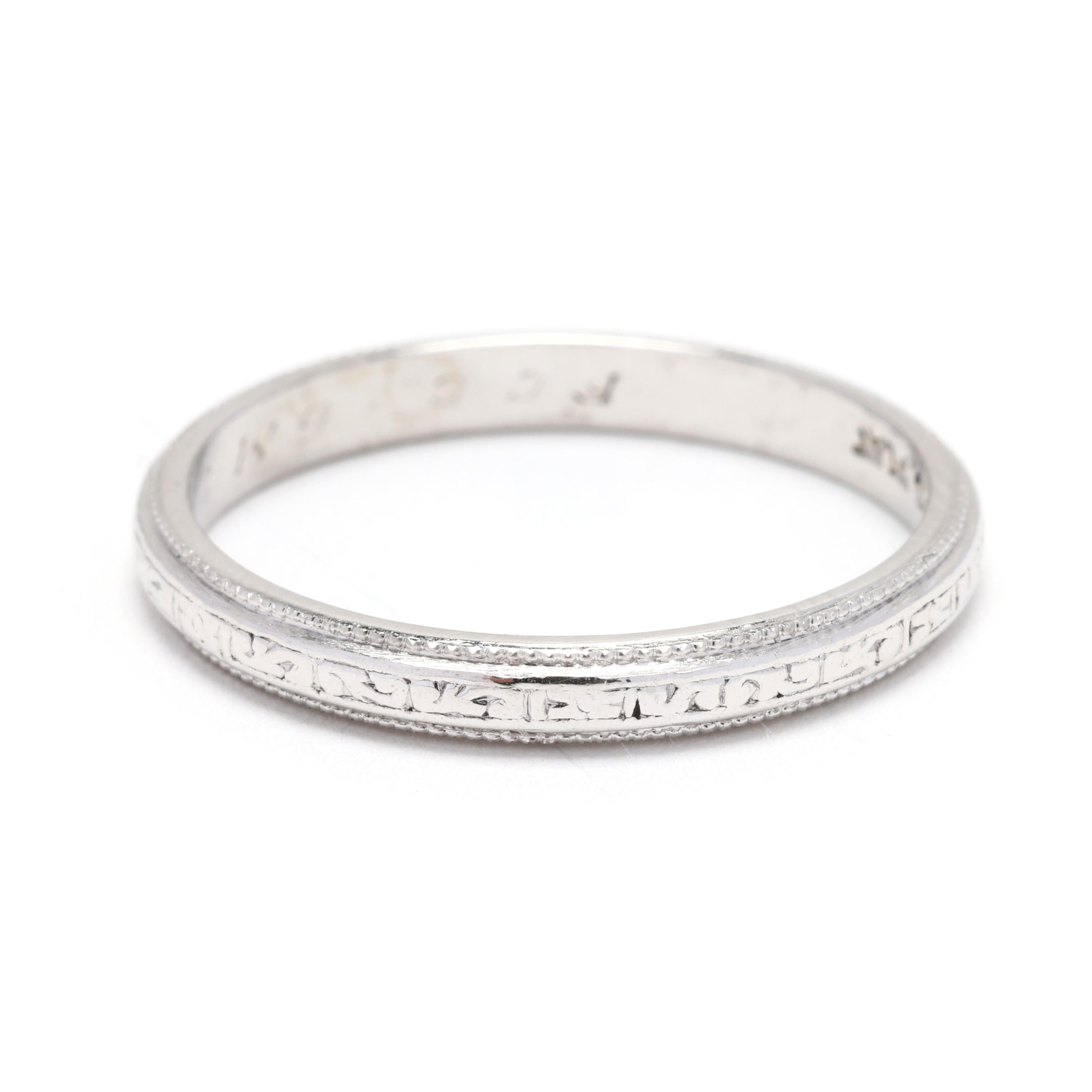 Add vintage sophistication to your collection with this beautifully engraved band ring, crafted in luxurious platinum. This size 6.75 ring features intricate, hand-engraved detailing, making it a timeless choice for stacking or wearing solo. Its