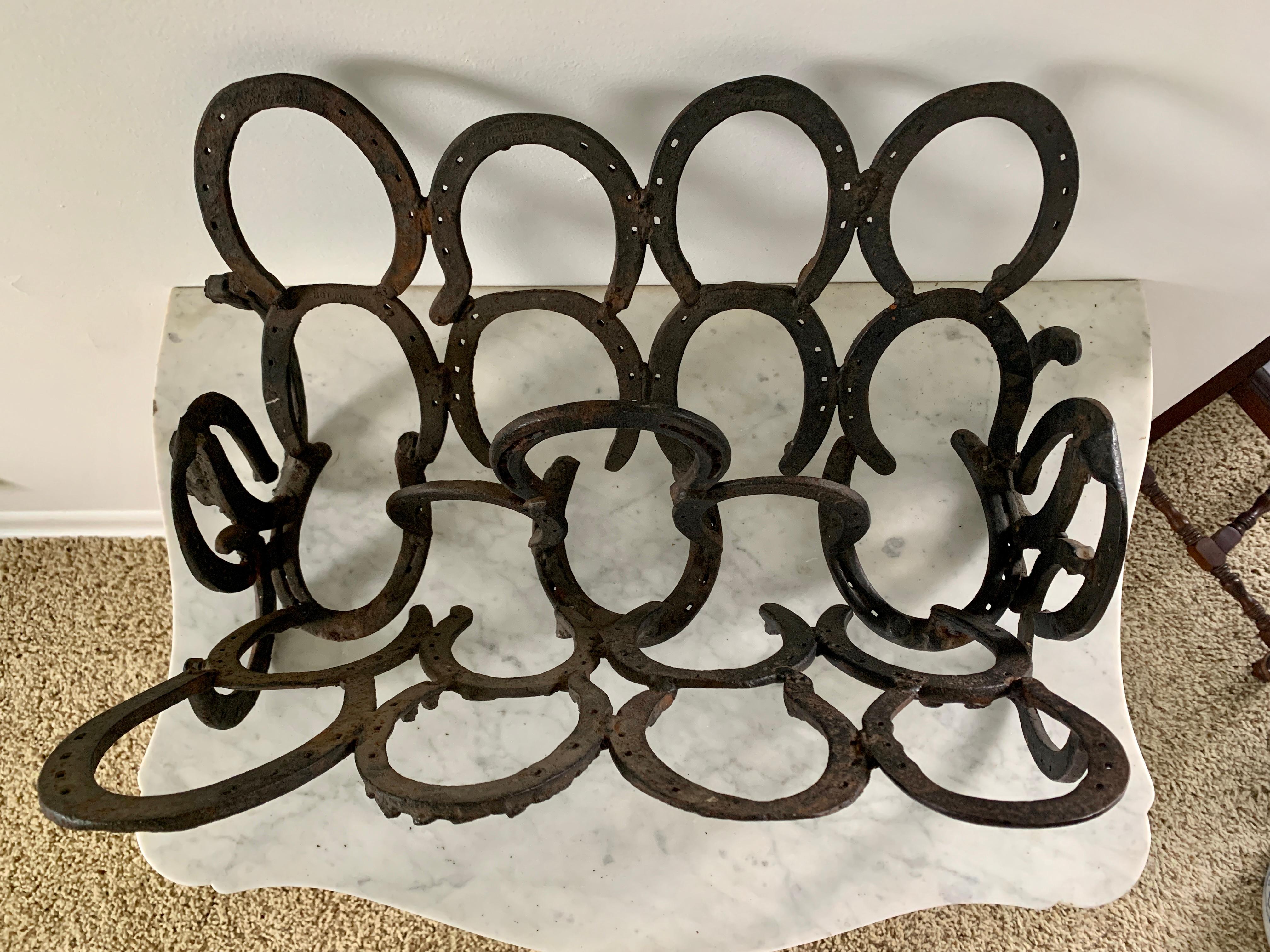 Rustic Vintage Equestrian Hand Forged Cast Iron Horseshoe Magazine Rack or Book Stand For Sale