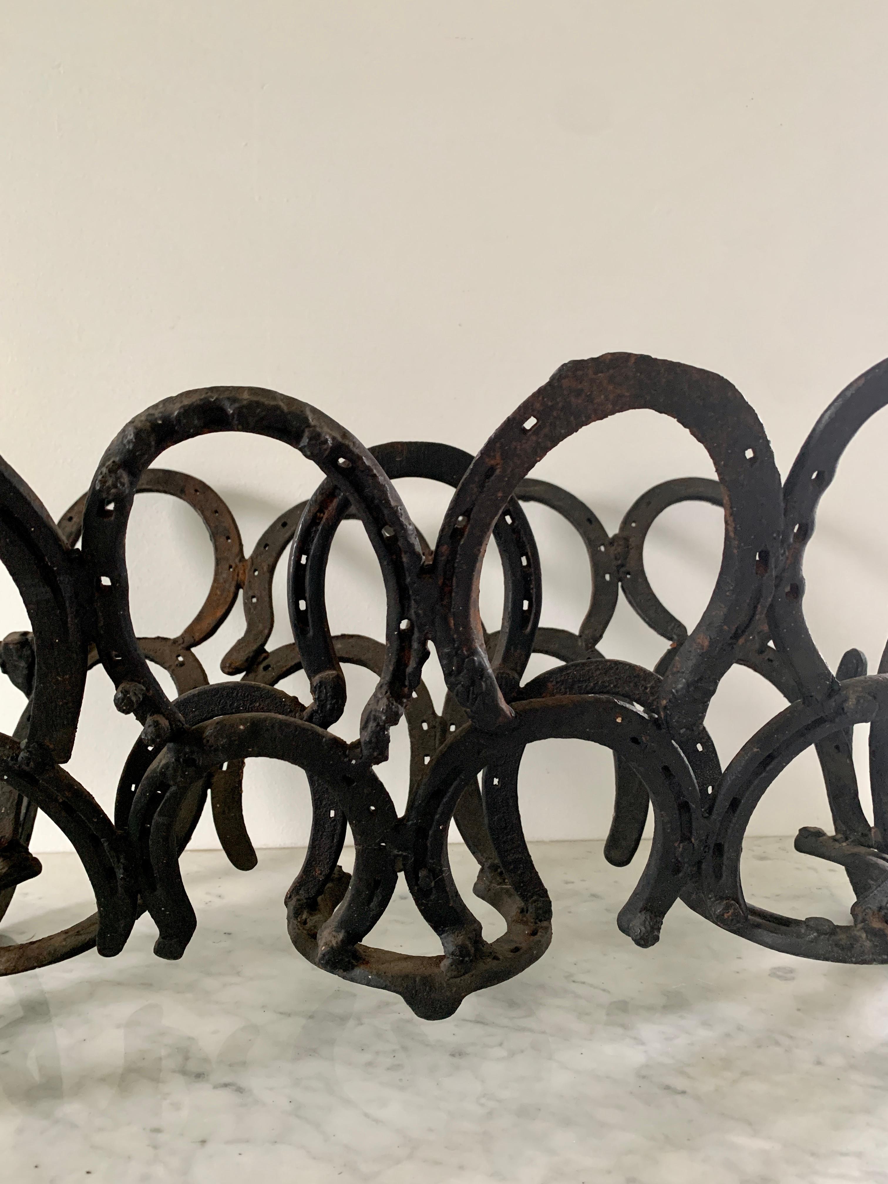 Vintage Equestrian Hand Forged Cast Iron Horseshoe Magazine Rack or Book Stand In Good Condition For Sale In Elkhart, IN