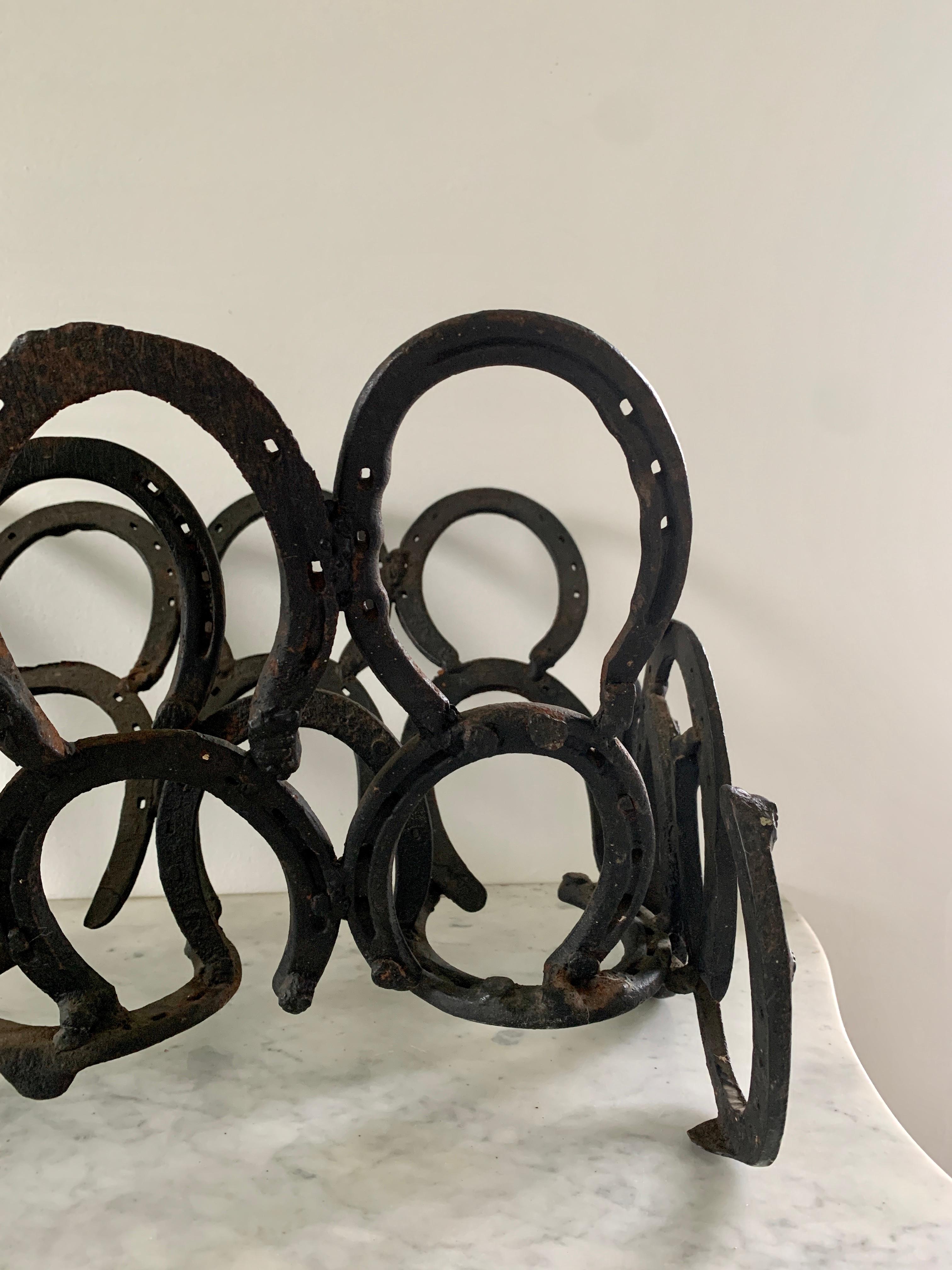 20th Century Vintage Equestrian Hand Forged Cast Iron Horseshoe Magazine Rack or Book Stand For Sale