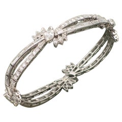 Pulsera entrecruzada vintage de platino y diamantes de 7,10 quilates