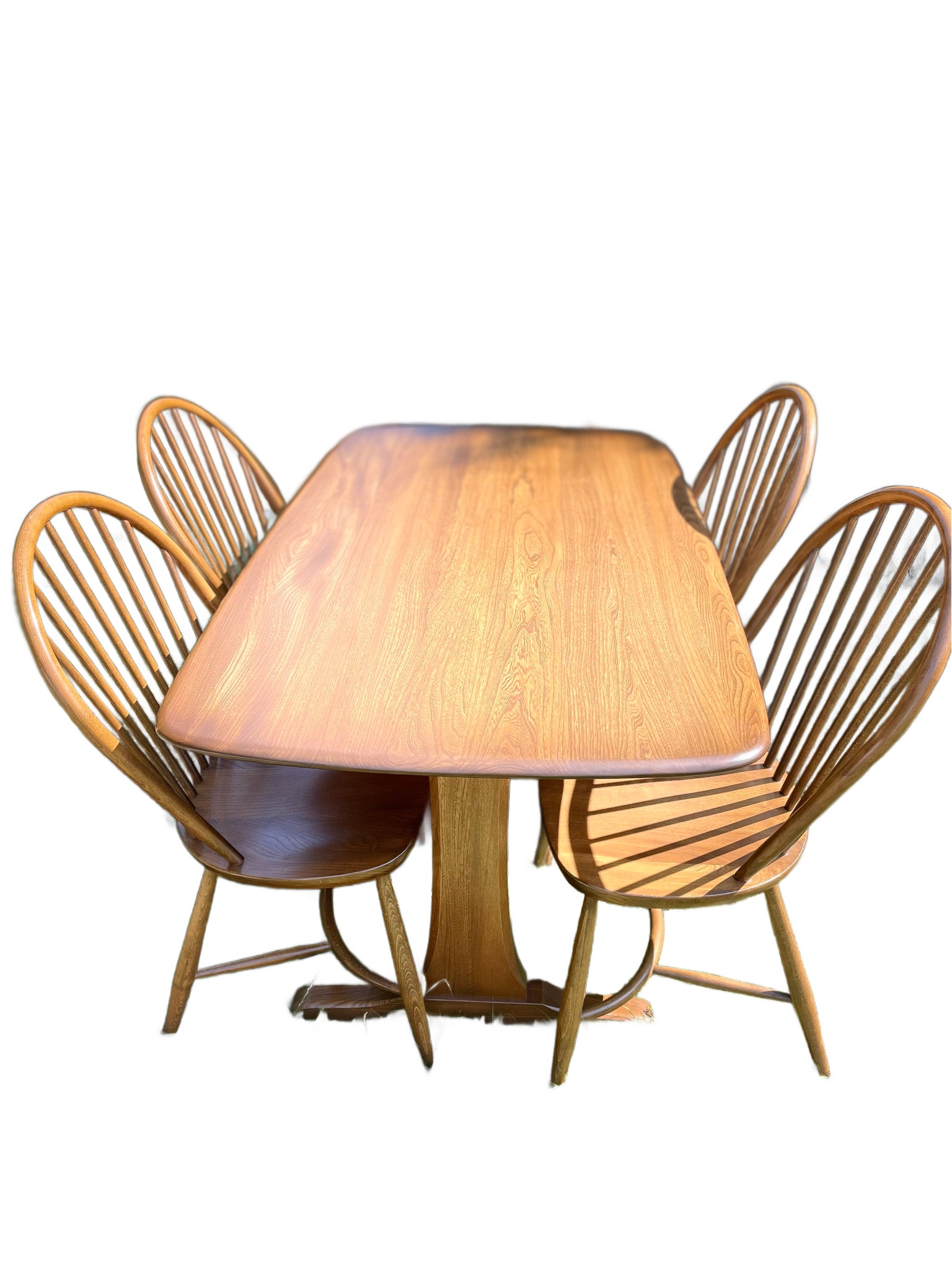 Vintage Ercol Dining Table & Four Rare Model 909 Latimer Steam-Bent Chairs (c.1970).

A beautifully preserved Ercol dining set from the 1970s, featuring a solid ash table in the sought-after Golden Dawn finish and four exceptionally rare Model 909
