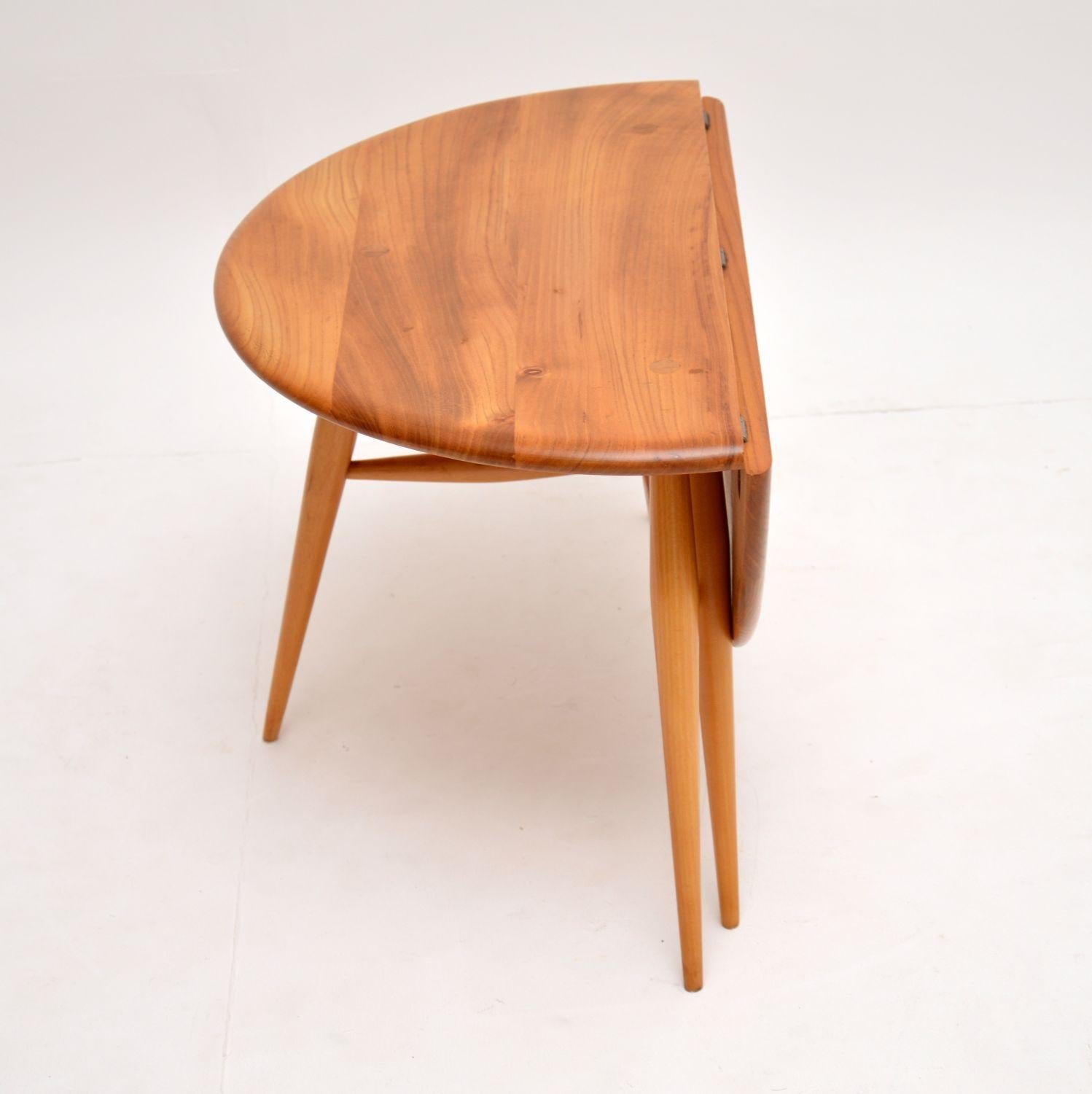 A stunning drop leaf vintage coffee table by Ercol, this dates from the 1960s-1970s. It’s of amazing quality, and is in perfect condition. We have had this completely stripped and re-polished to a very high standard. It’s made from solid elm, with