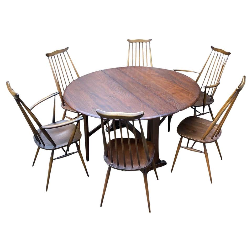 Six Vintage Ercol stick windsor back chairs with two Armchairs For Sale ...