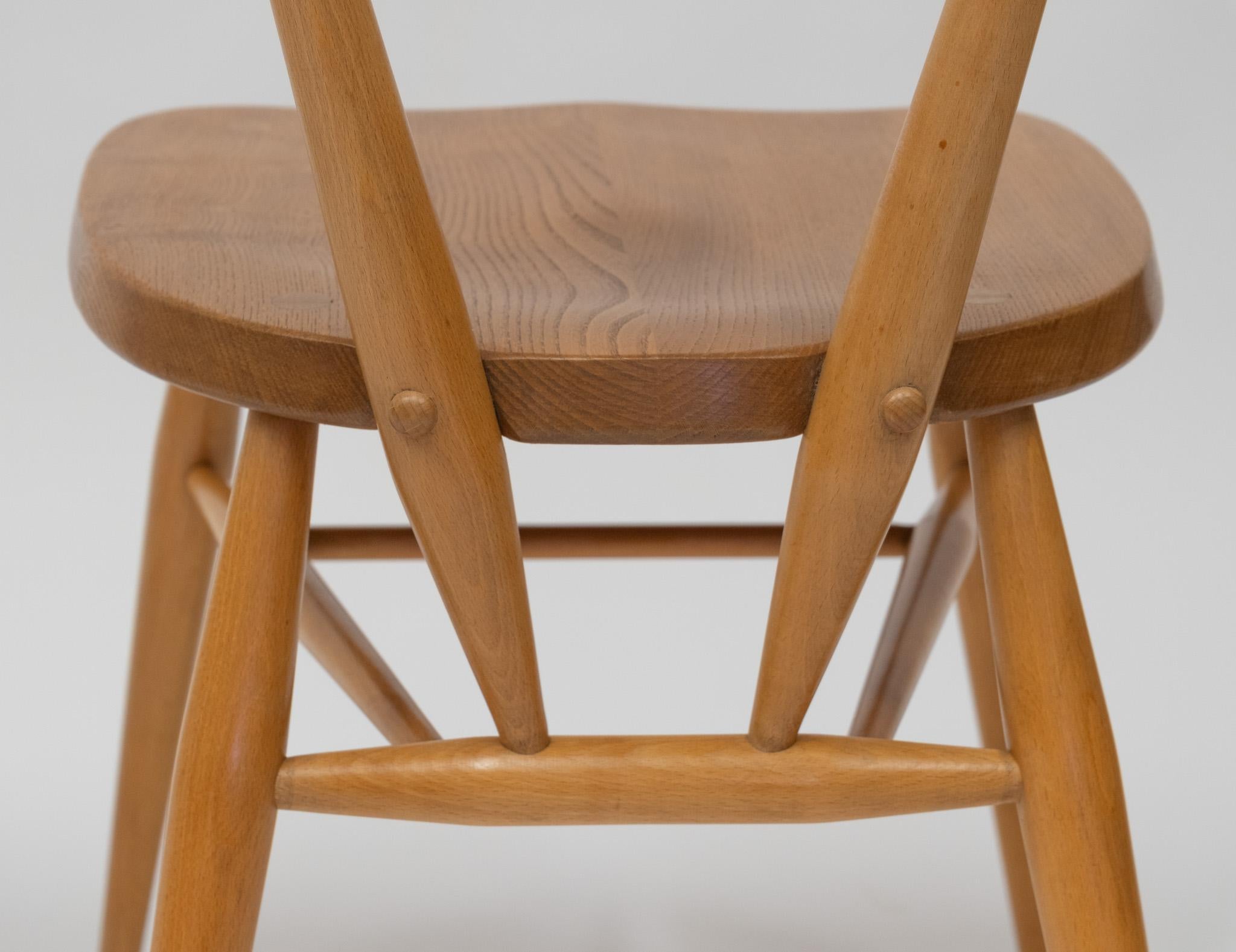 Beech Vintage Ercol Green Spot Stacking Set Of Two Dining Chairs 1950s For Sale