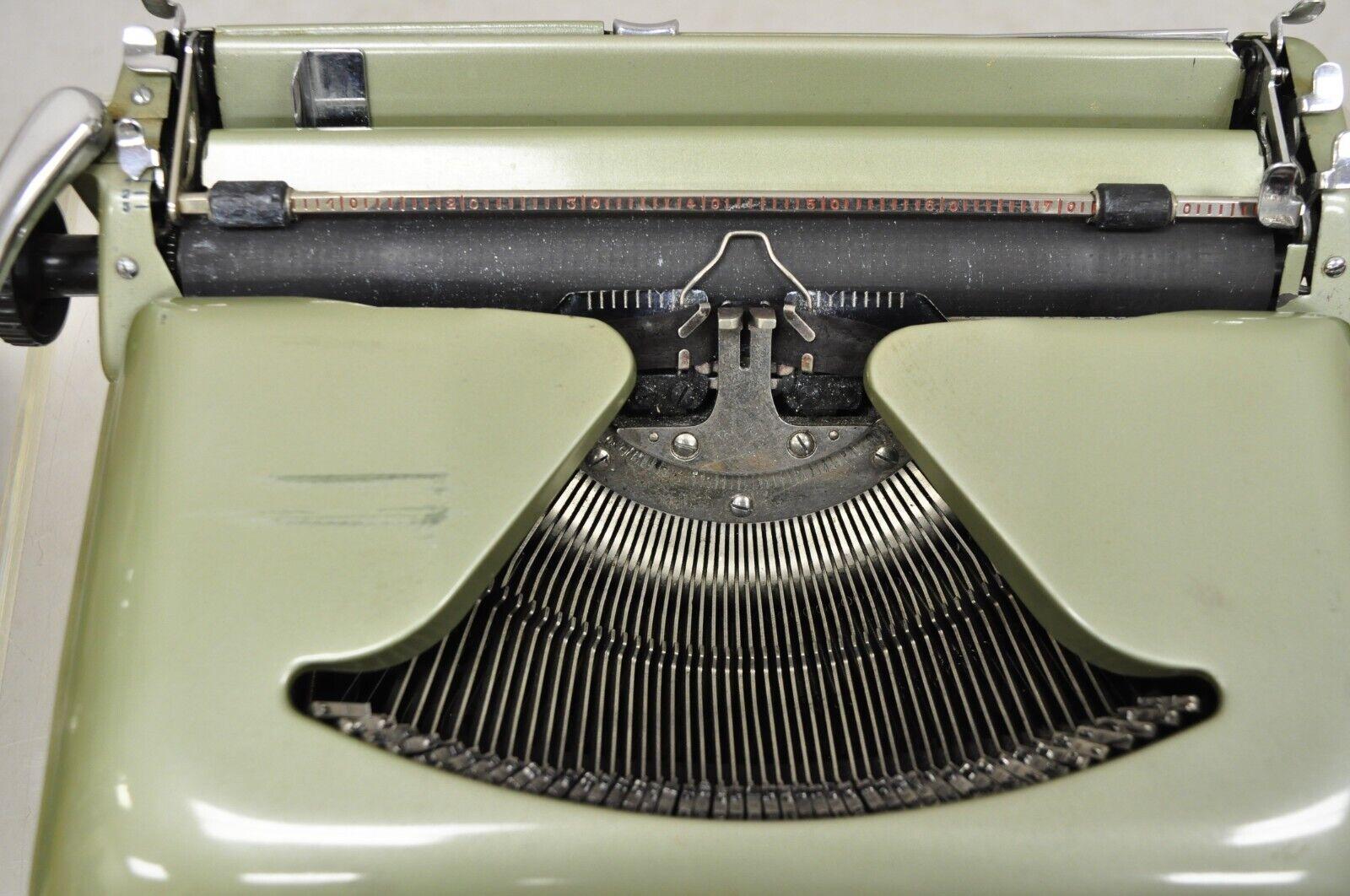 vintage portable typewriter with case