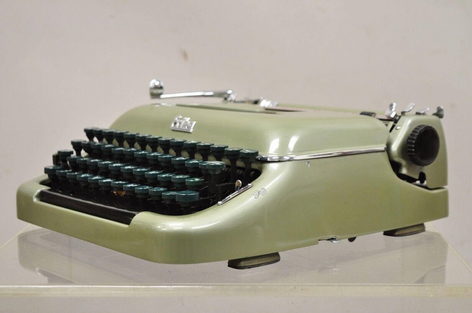 vintage portable typewriter with case