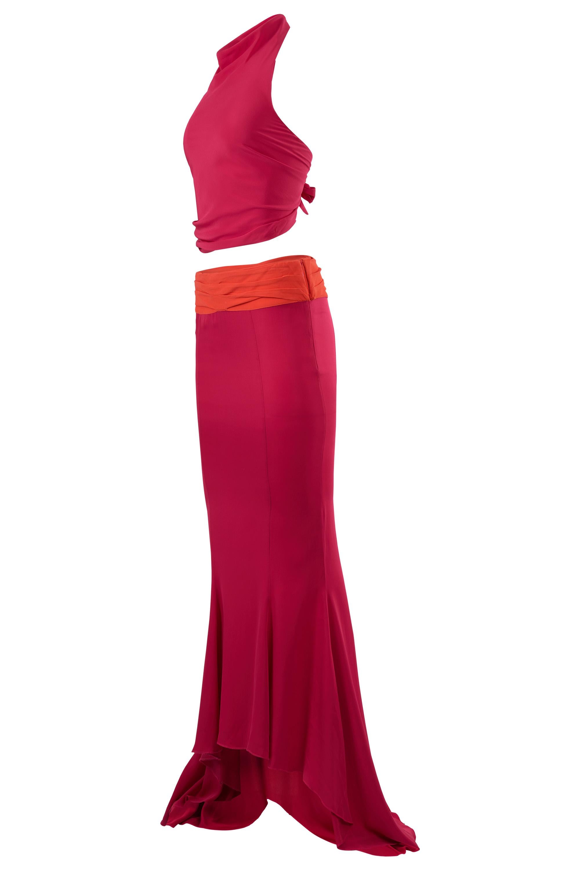 Vintage Ermanno Scervino Spring Summer 2007 Pink & Orange  Silk Co- Ord Set . Featuring a sleek halter-neck  crop top and dramatic mermaid  style maxi skirt . Orange waistband in a contrasting electric orange . 

Brand: Ermanno Scervino
Size: UK