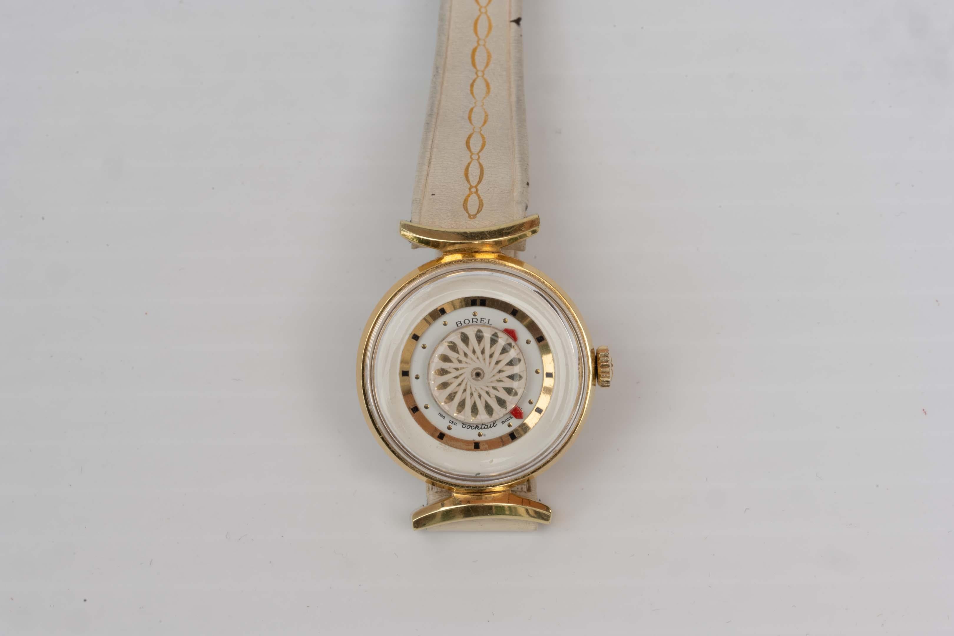 1970 Ernest Borel Cocktail Damenuhr mit weißem Zifferblatt. Originalteile und -armband, 17 Juwelen, das Gehäuse misst 26,5 mm mit Krone. In gutem Zustand, Genauigkeit wird nicht garantiert. Das Armband weist Gebrauchsspuren auf, Swiss made