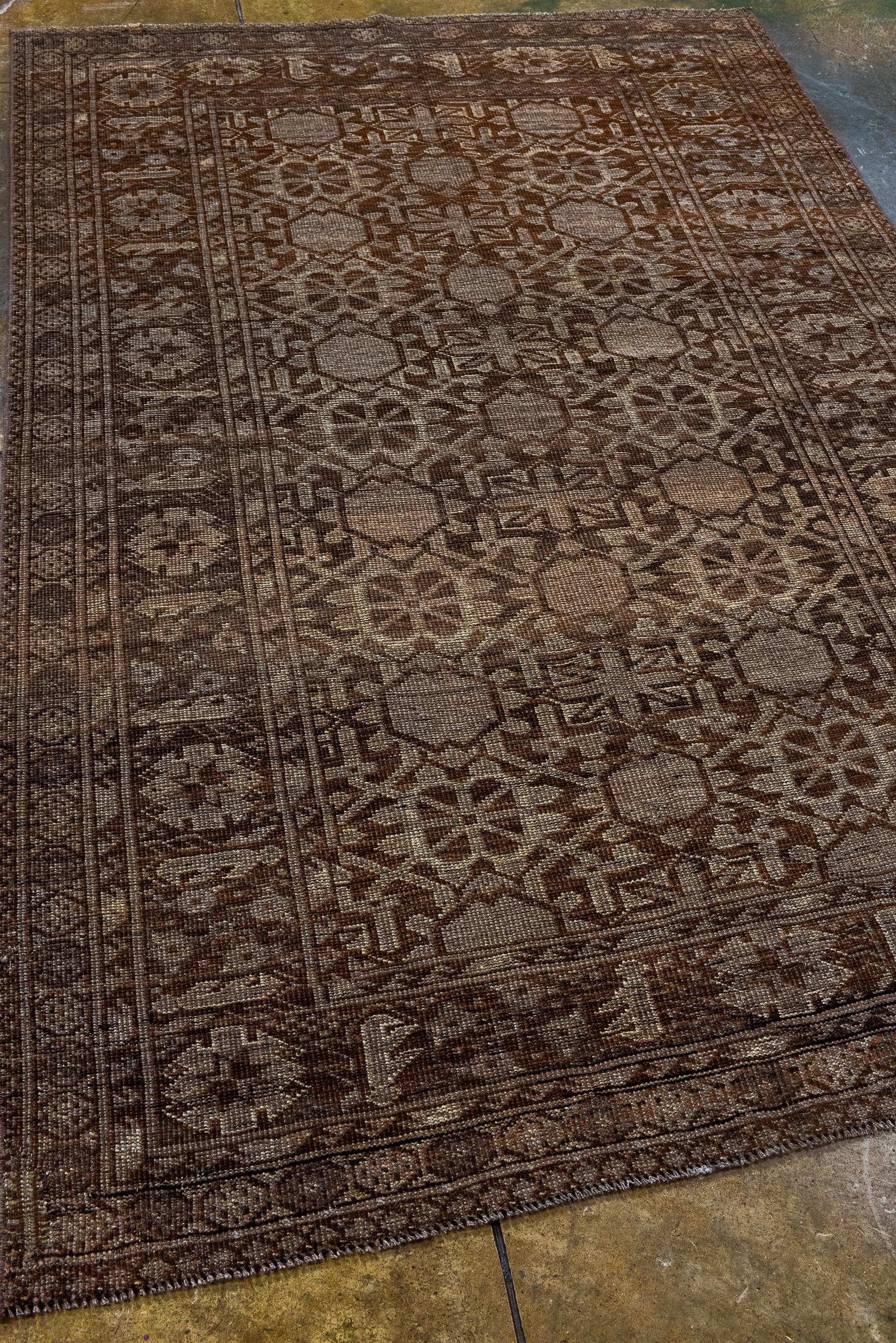 Afghan Vintage Ersari Rug with Khani Floral Rosettes and Dark Brown Colors