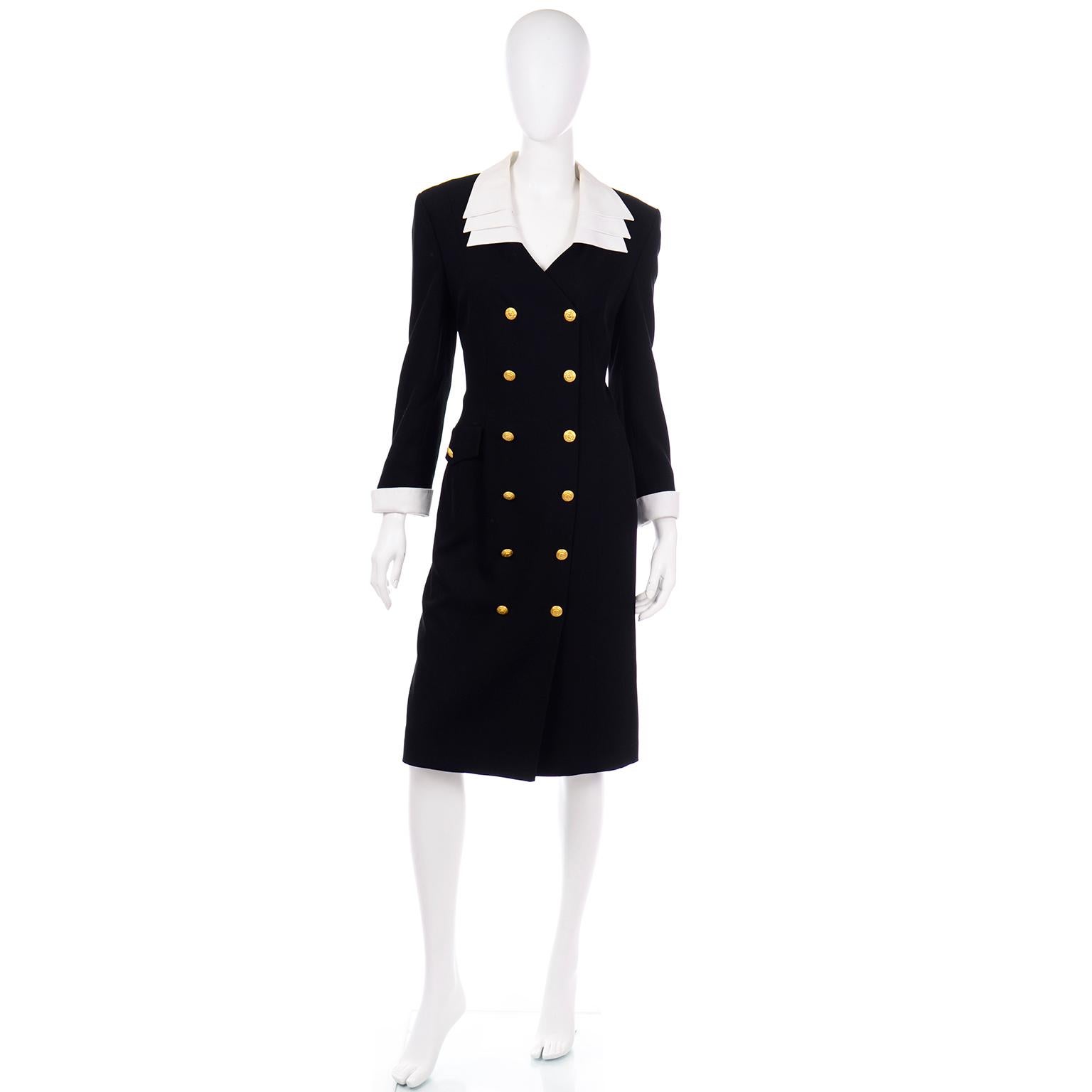 This is a fantastic double breasted black wool dress with removable cuffs and collar designed by Margaretha Ley for Escada. We love vintage Escada and are so happy that people are starting to rediscover these beautifully made pieces!This dress has a